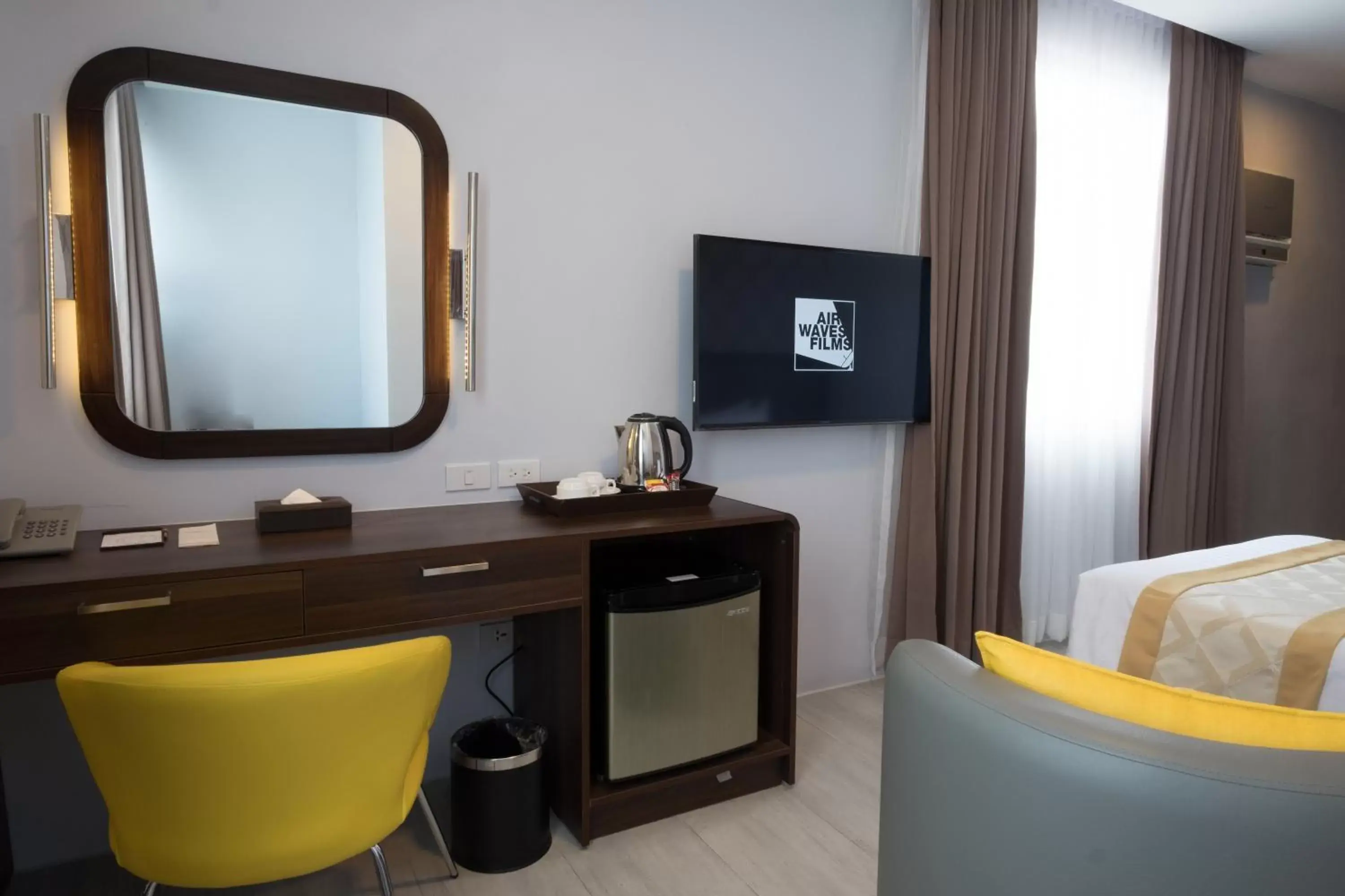 TV and multimedia, TV/Entertainment Center in One Central Hotel & Suites