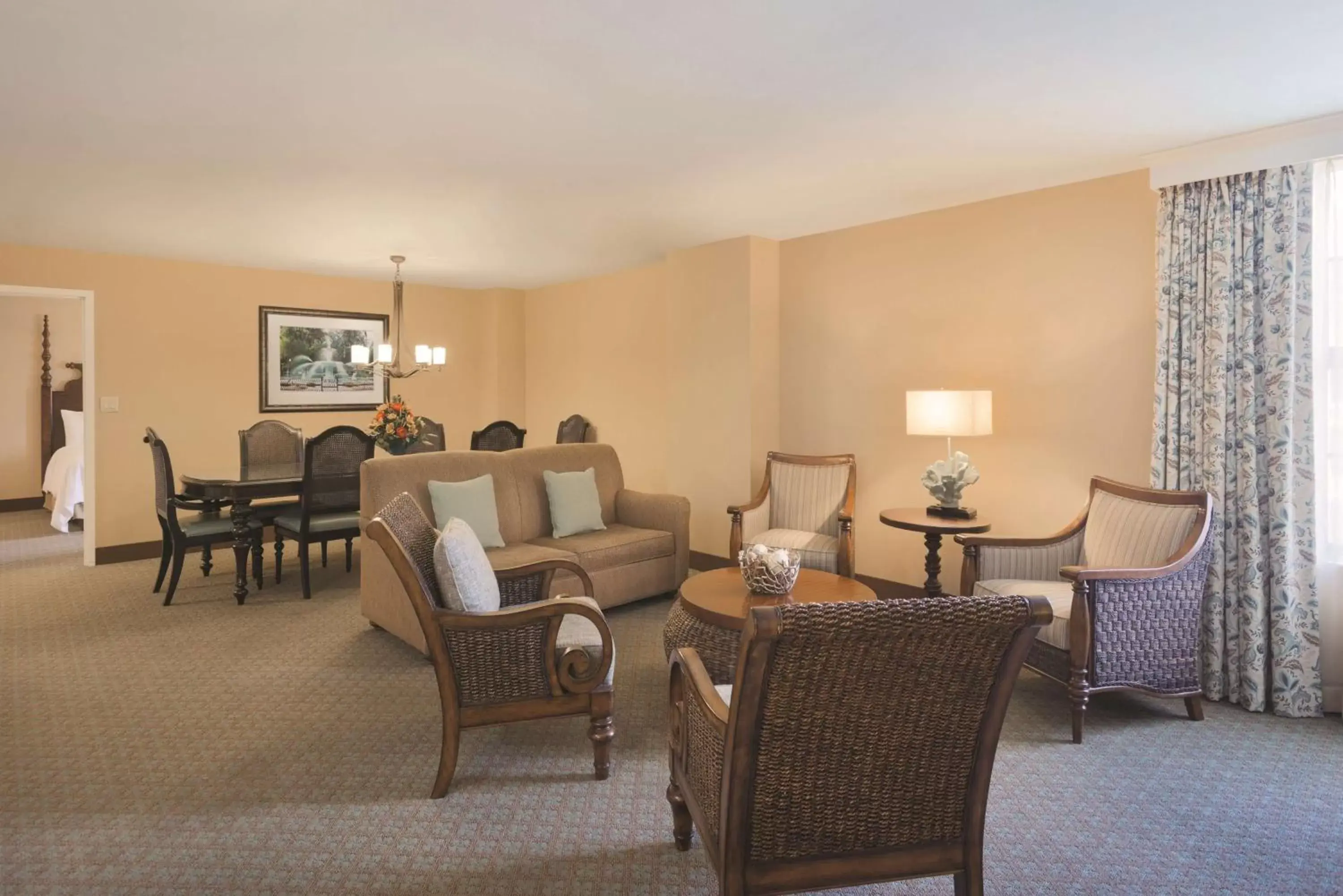 Bed, Seating Area in Embassy Suites Savannah Historic District