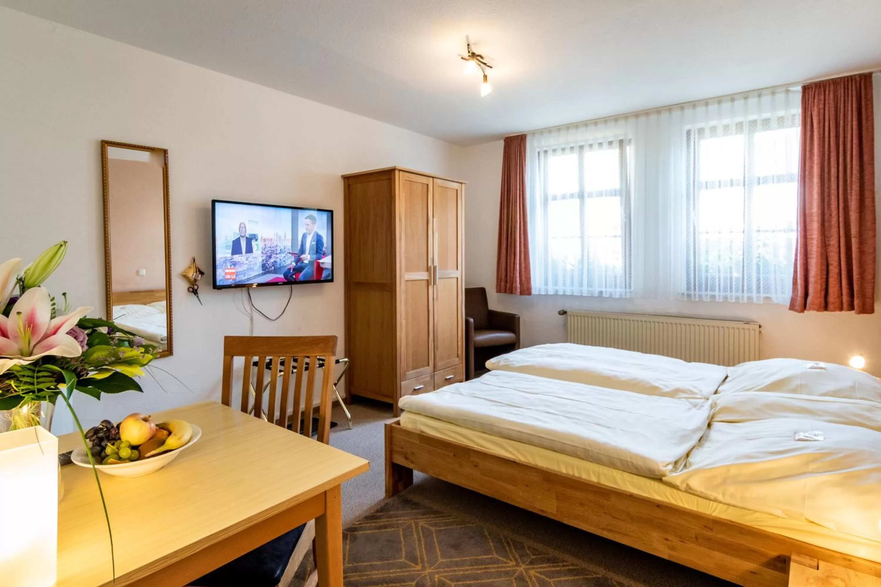 Photo of the whole room, Bed in Hotel Goldflair am Rathaus