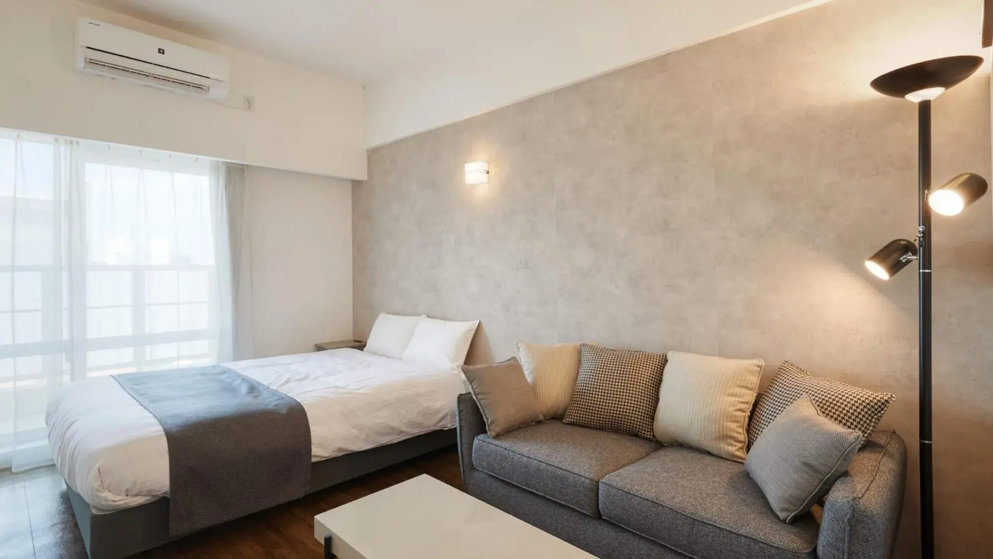 Photo of the whole room, Bed in New Normal Hotel in NAMINOUE ニューノーマルホテルイン波の上 Photo of the whole room, Bed in New Normal Hotel in NAMINOUE ニューノーマルホテルイン波の上