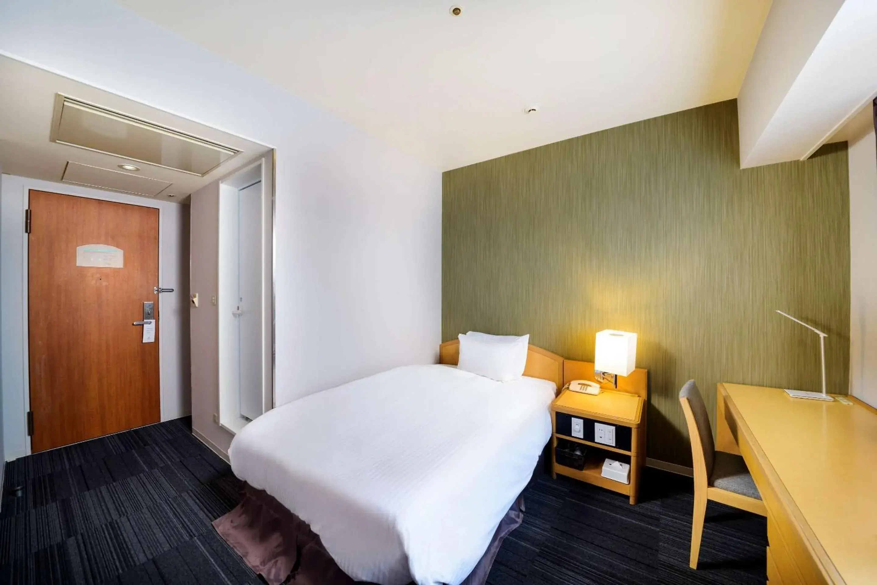 Bedroom, Bed in SureStay Plus Hotel by Best Western Shin-Osaka