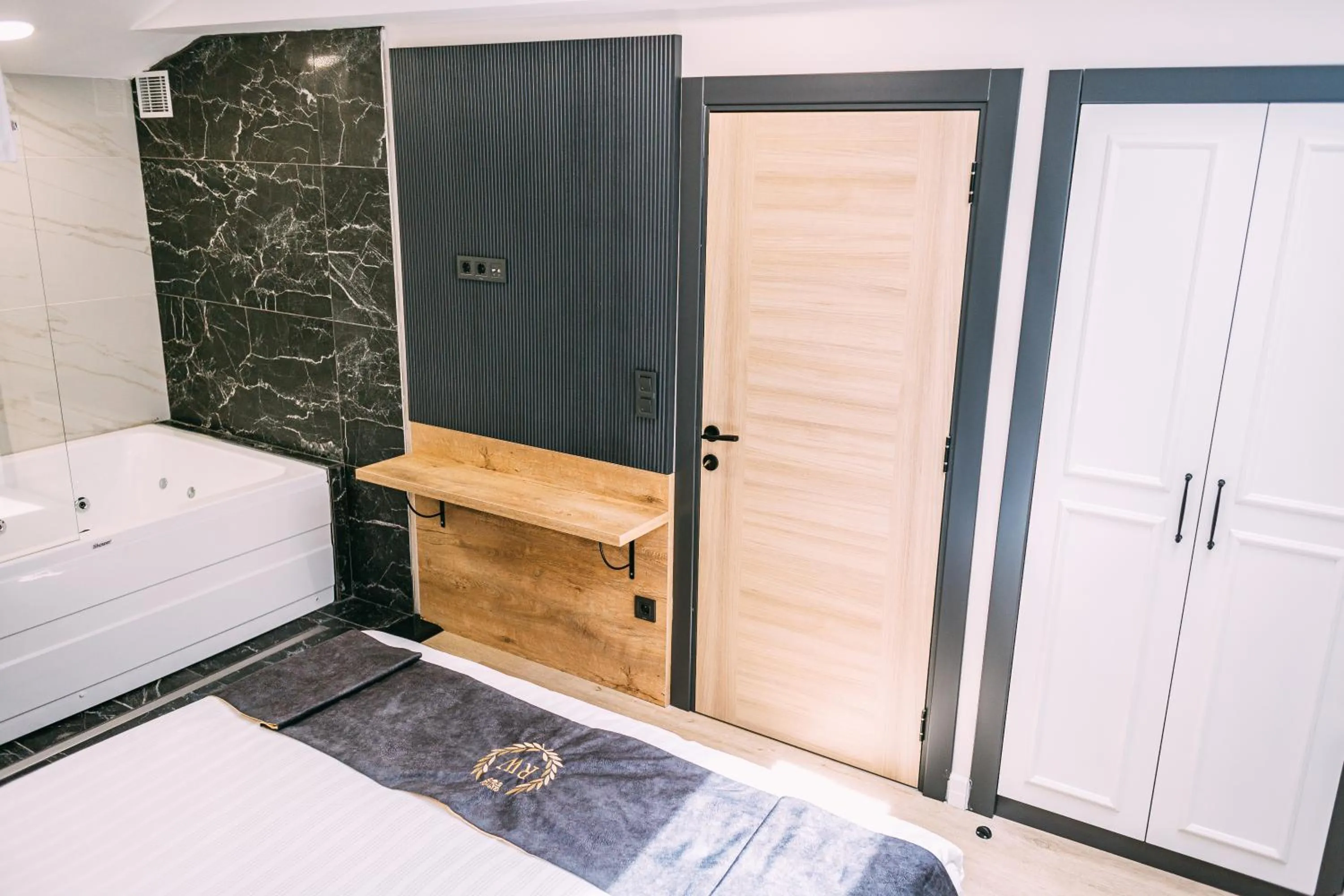 Bed in RW BOUTIQUE HOTEL