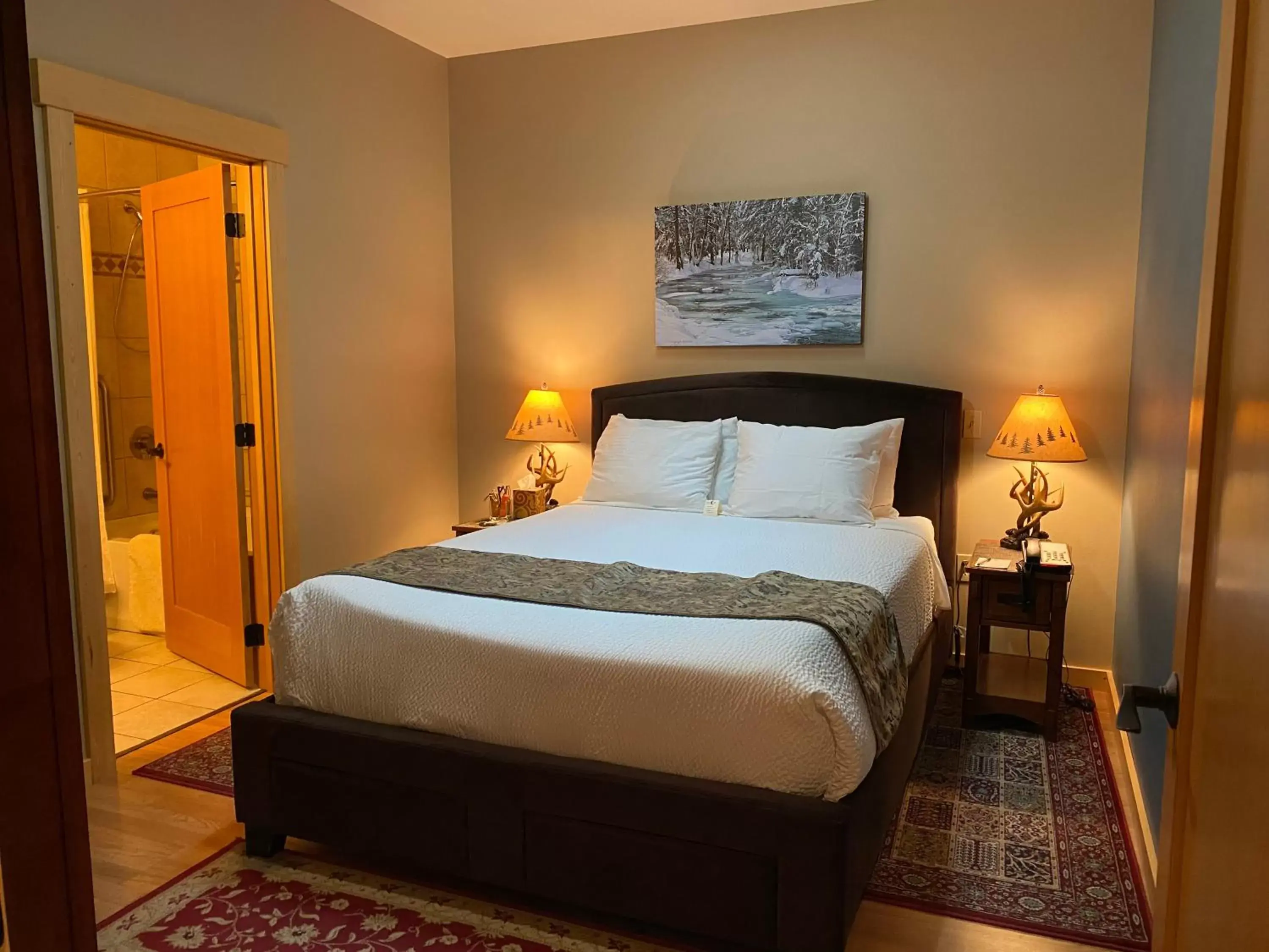 Bed in Twisp River Suites