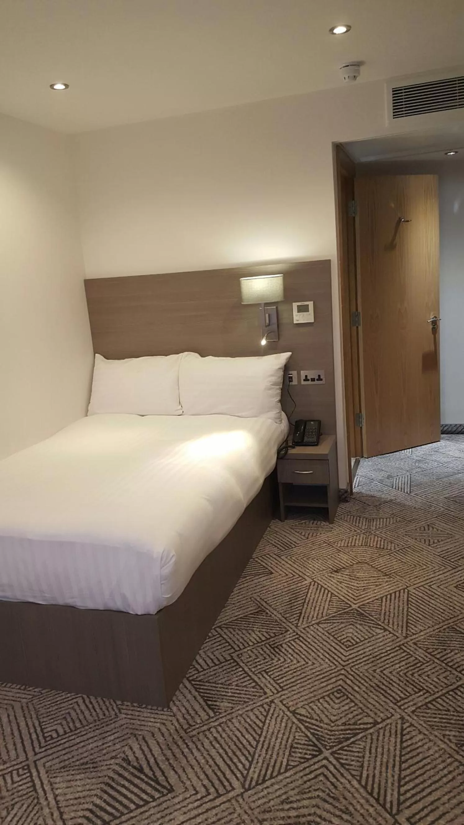 Bed in The Lion & Key Hotel