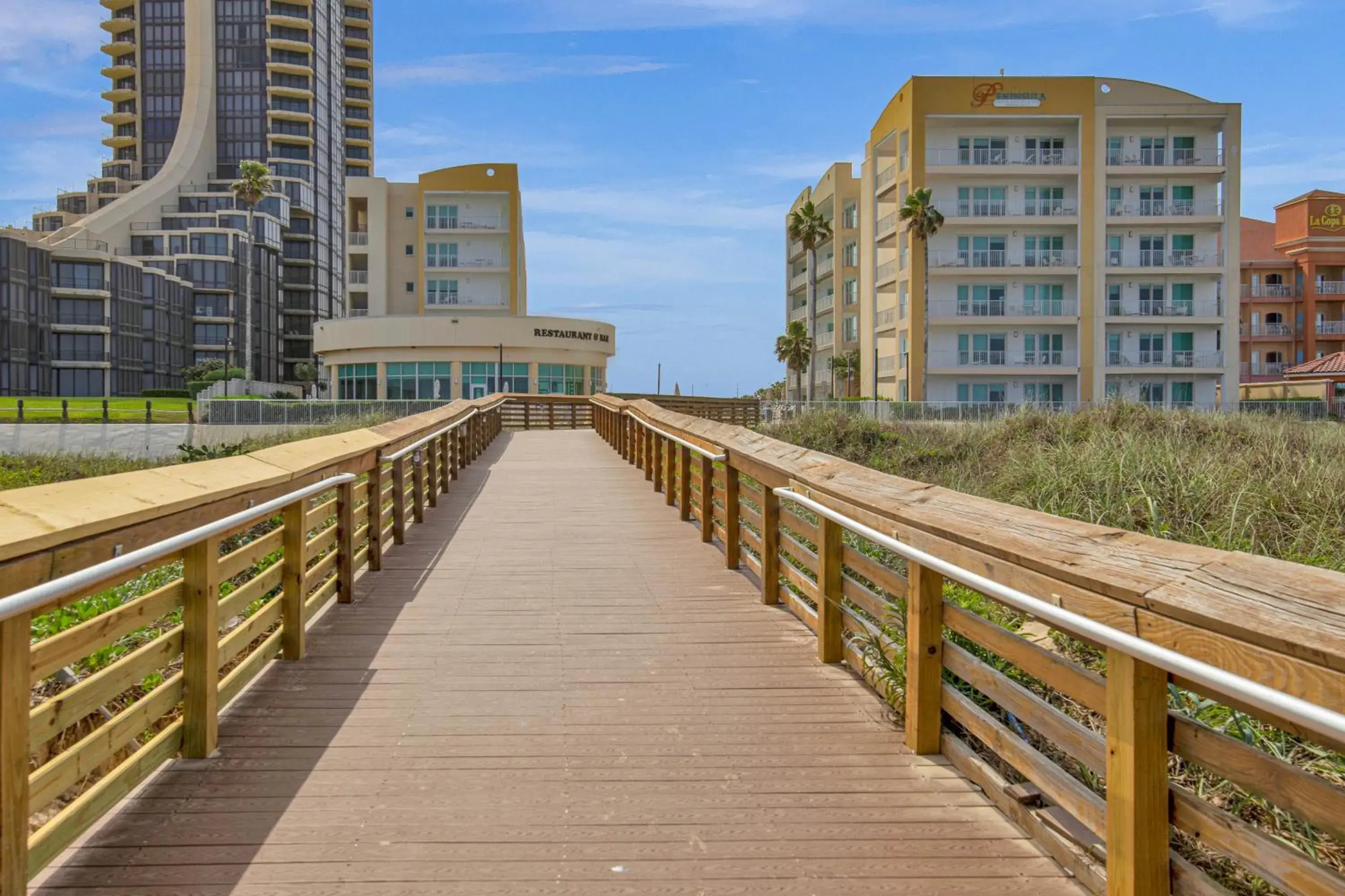 Property building in Peninsula Island Resort & Spa - Beachfront Property at South Padre Island Property building in Peninsula Island Resort & Spa - Beachfront Property at South Padre Island