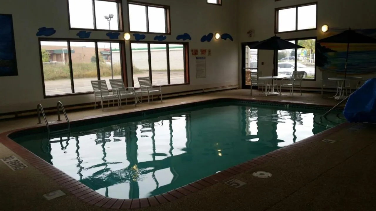 Swimming pool in AmericInn by Wyndham Forest Lake