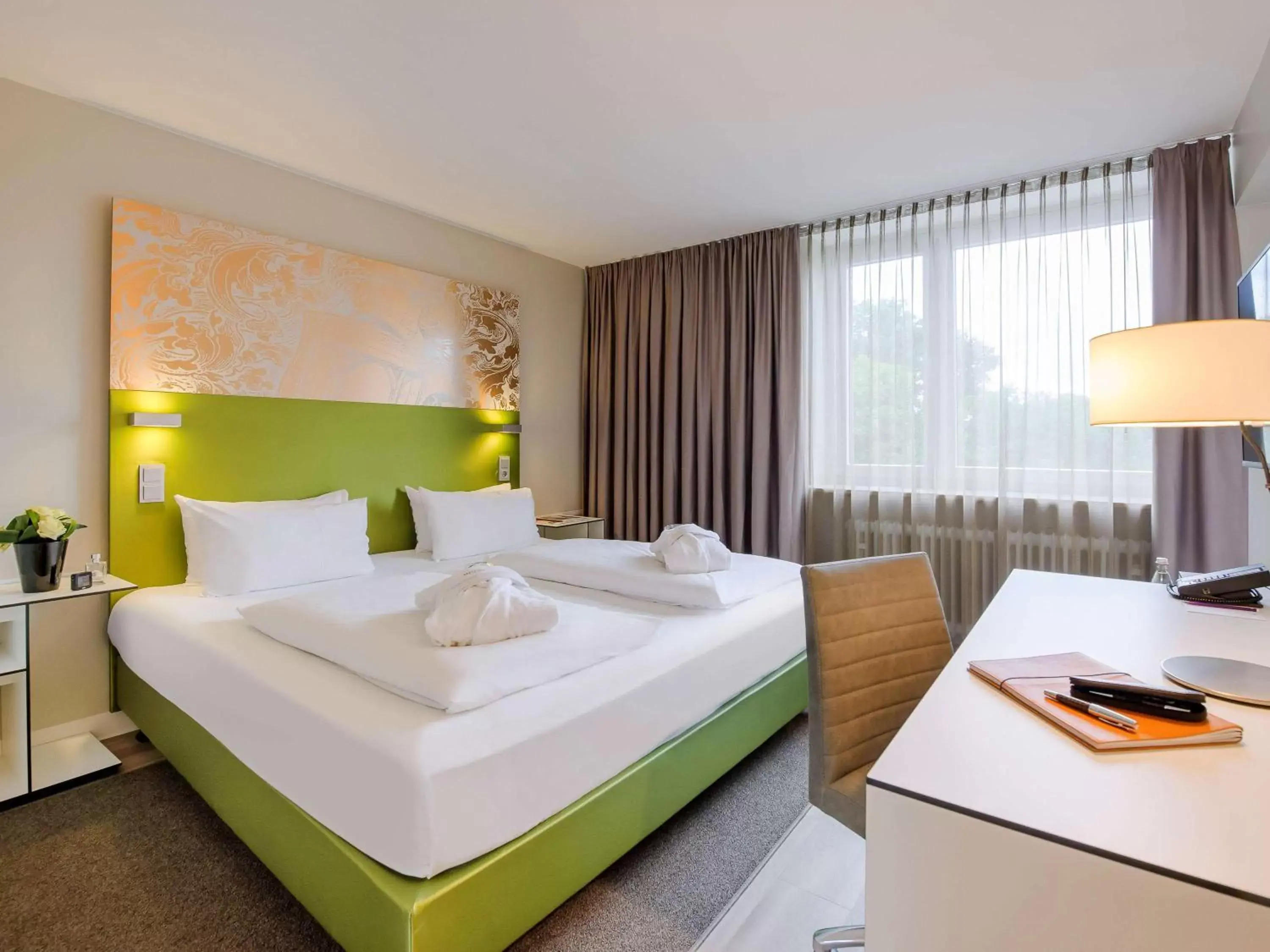 Photo of the whole room, Bed in Congress Hotel Mercure Nürnberg an der Messe