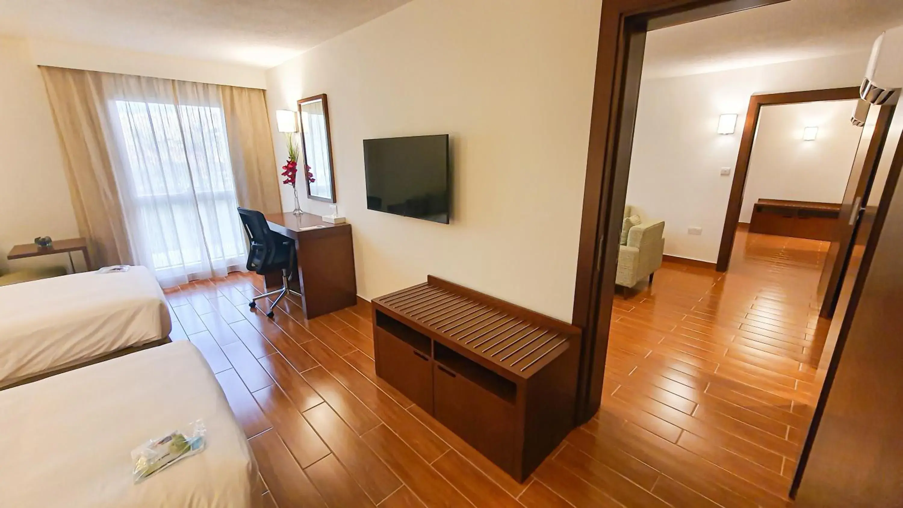 Bedroom, TV/Entertainment Center in Dhafra Beach Hotel