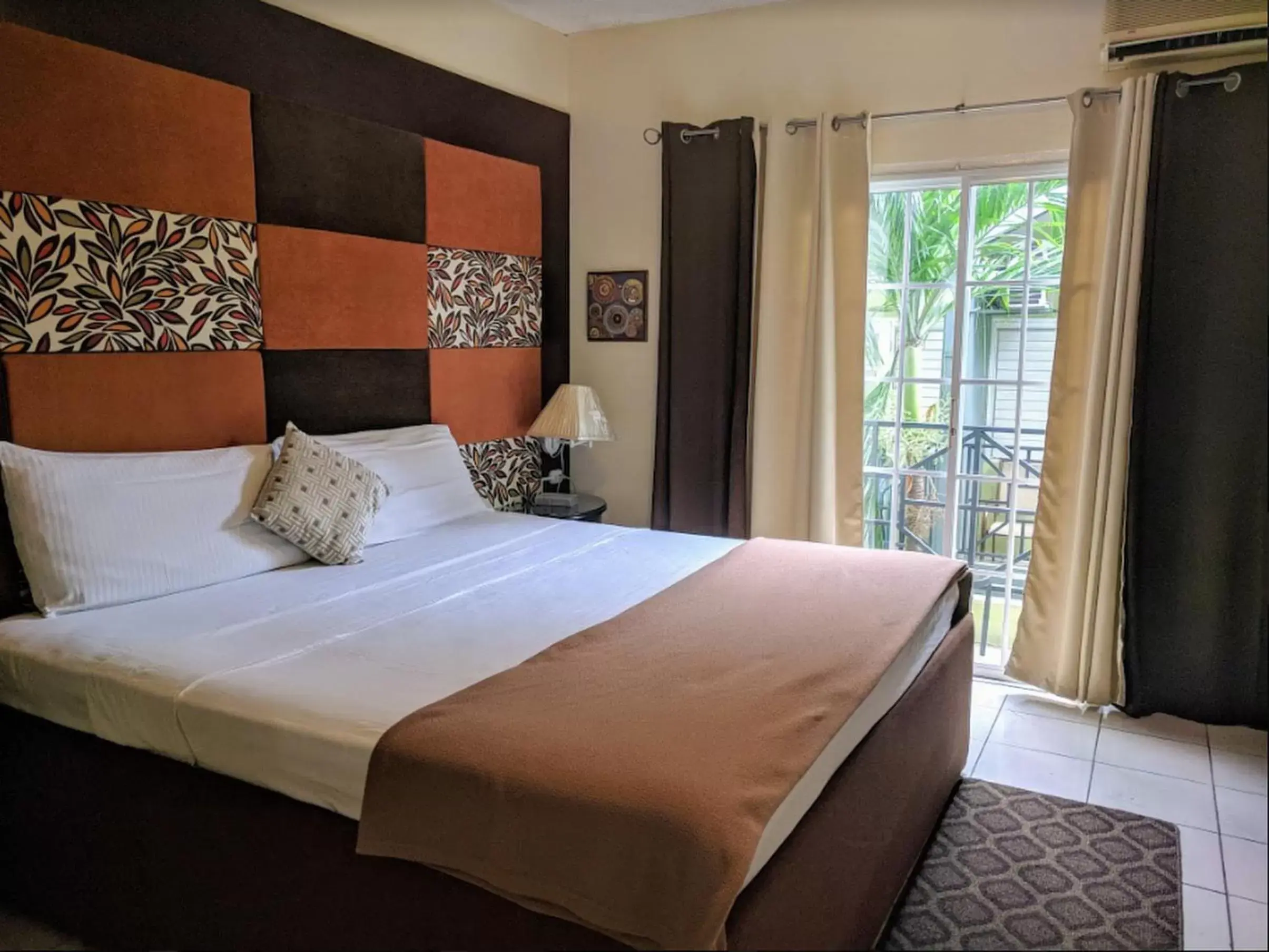 Bed in Christar Villas Hotel