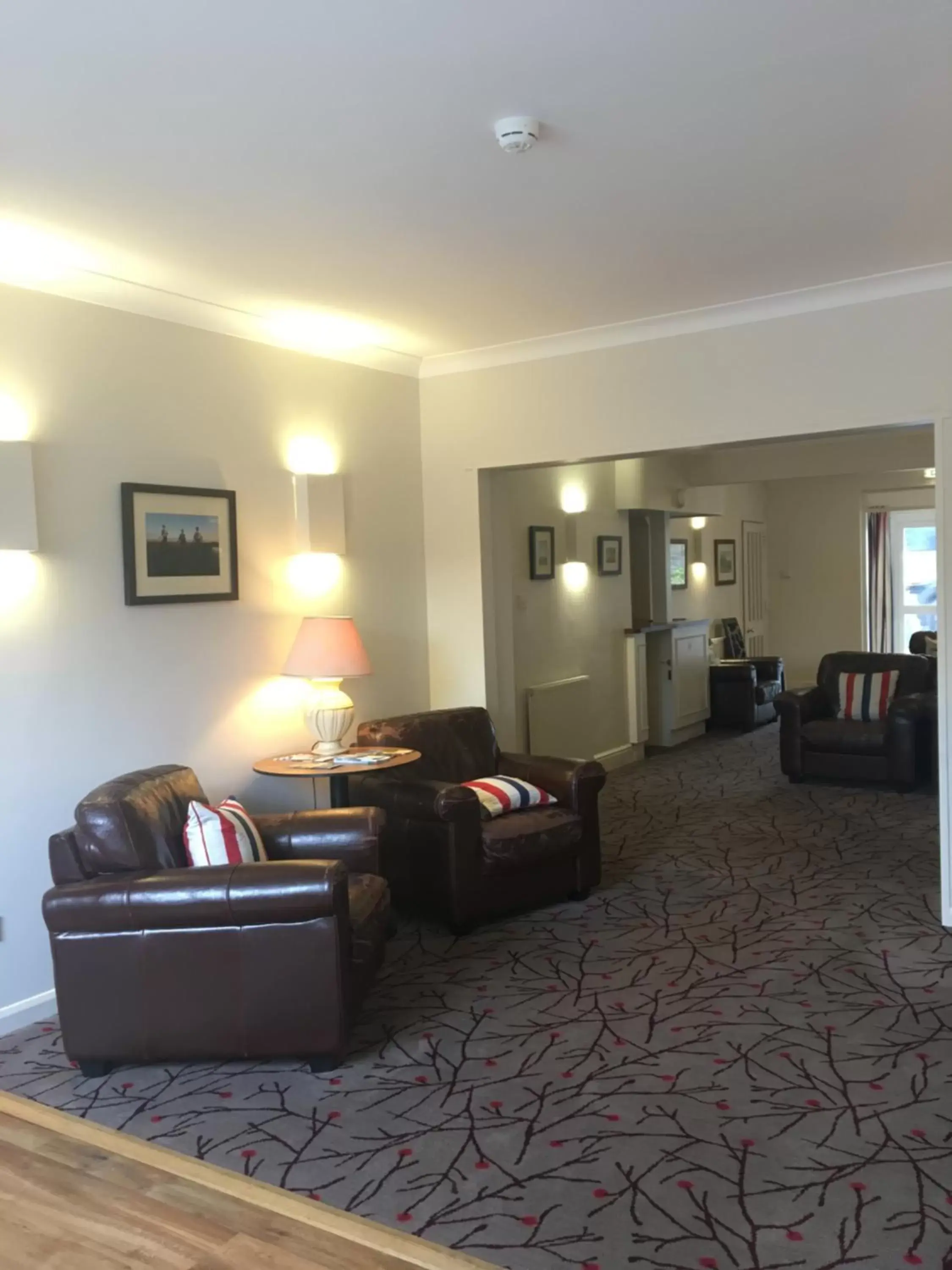 Communal lounge/ TV room, Seating Area in Penny Farthing Hotel & Cottages
