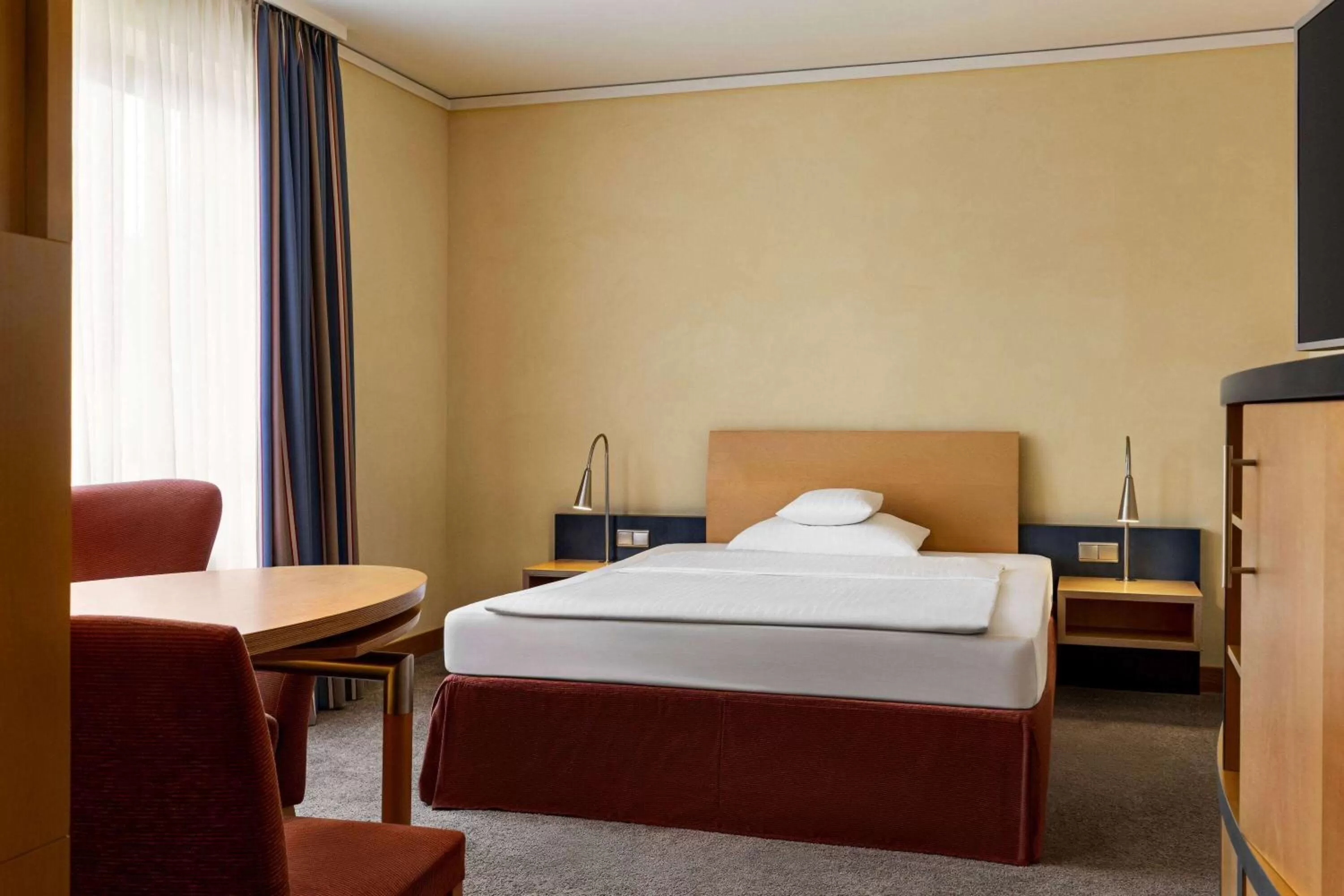 Bed in Vienna House by Wyndham Remarque Osnabrück