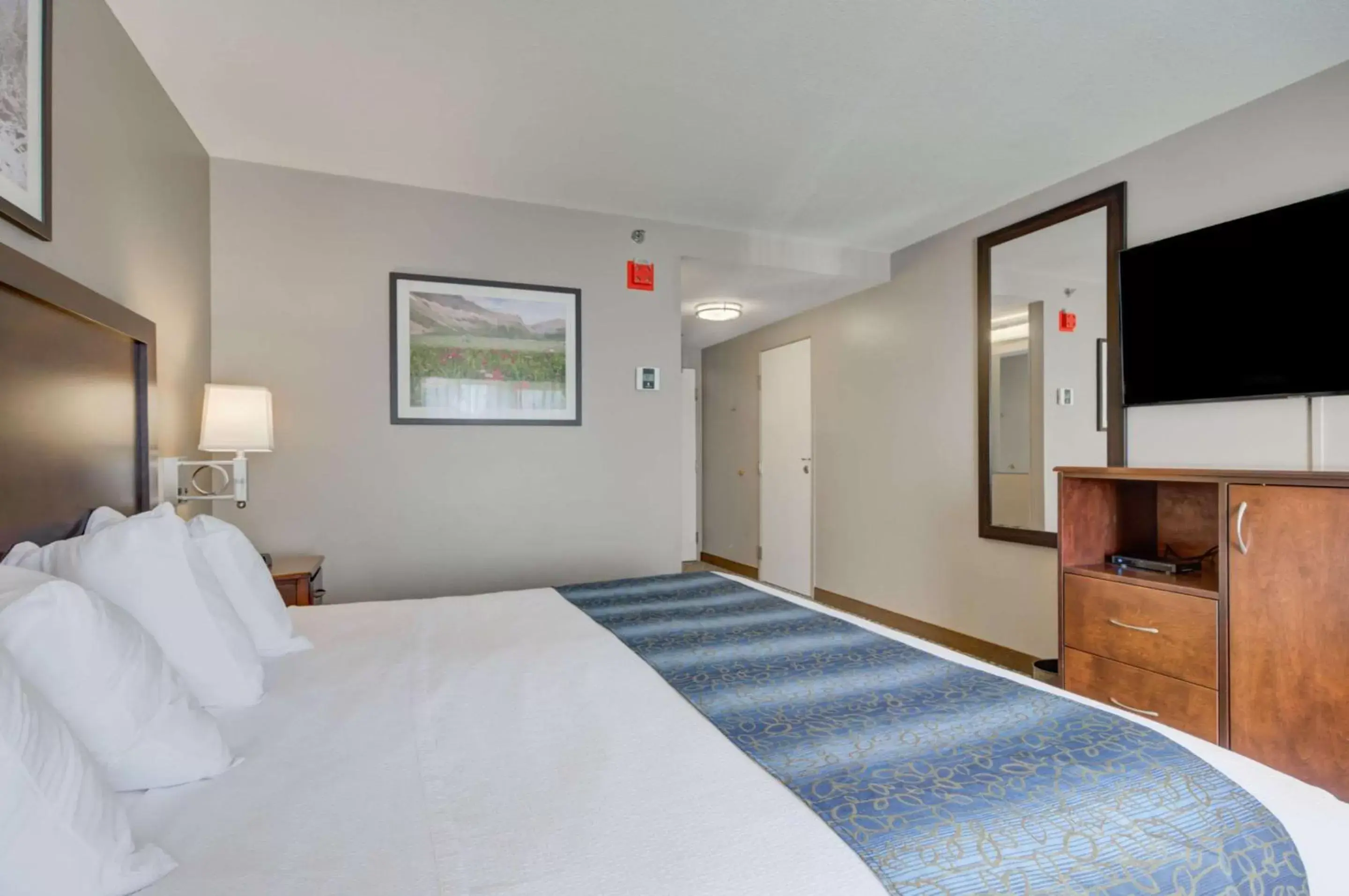 Bedroom, Bed in The Pine Lodge on Whitefish River, Ascend Hotel Collection