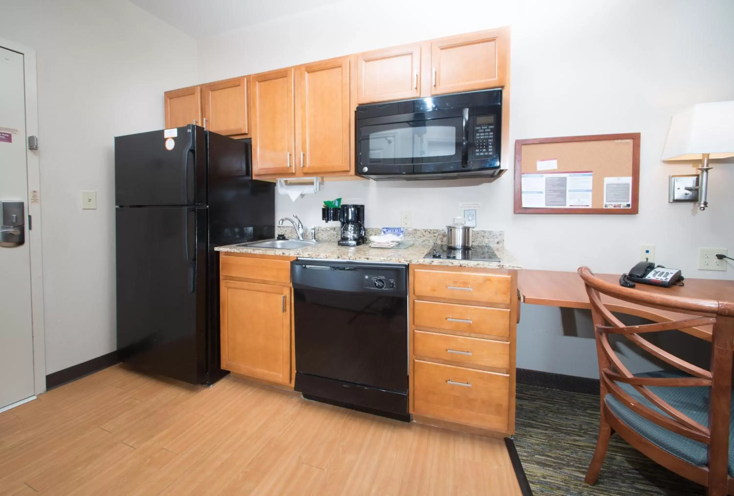 Kitchen/Kitchenette in Candlewood Suites Wake Forest-Raleigh Area, an IHG Hotel