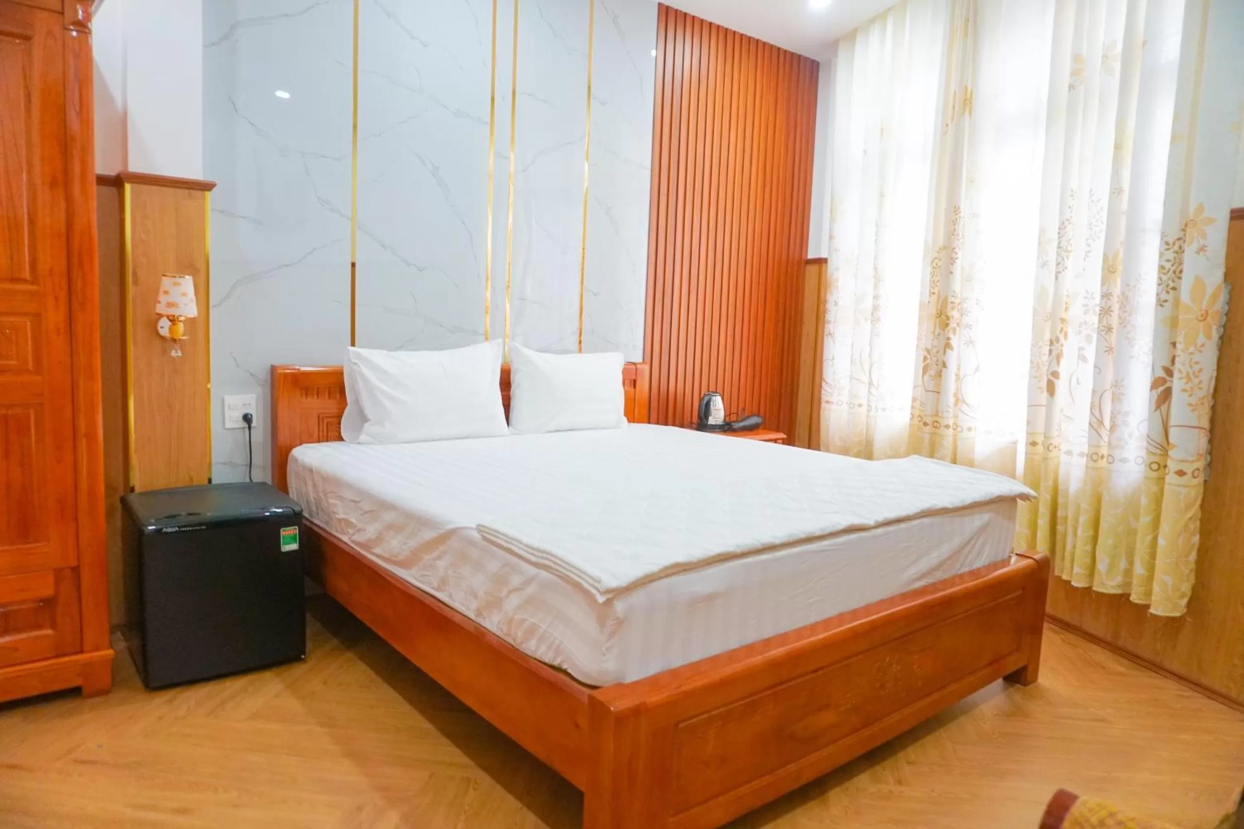 Bed in Nhu Y Hotel