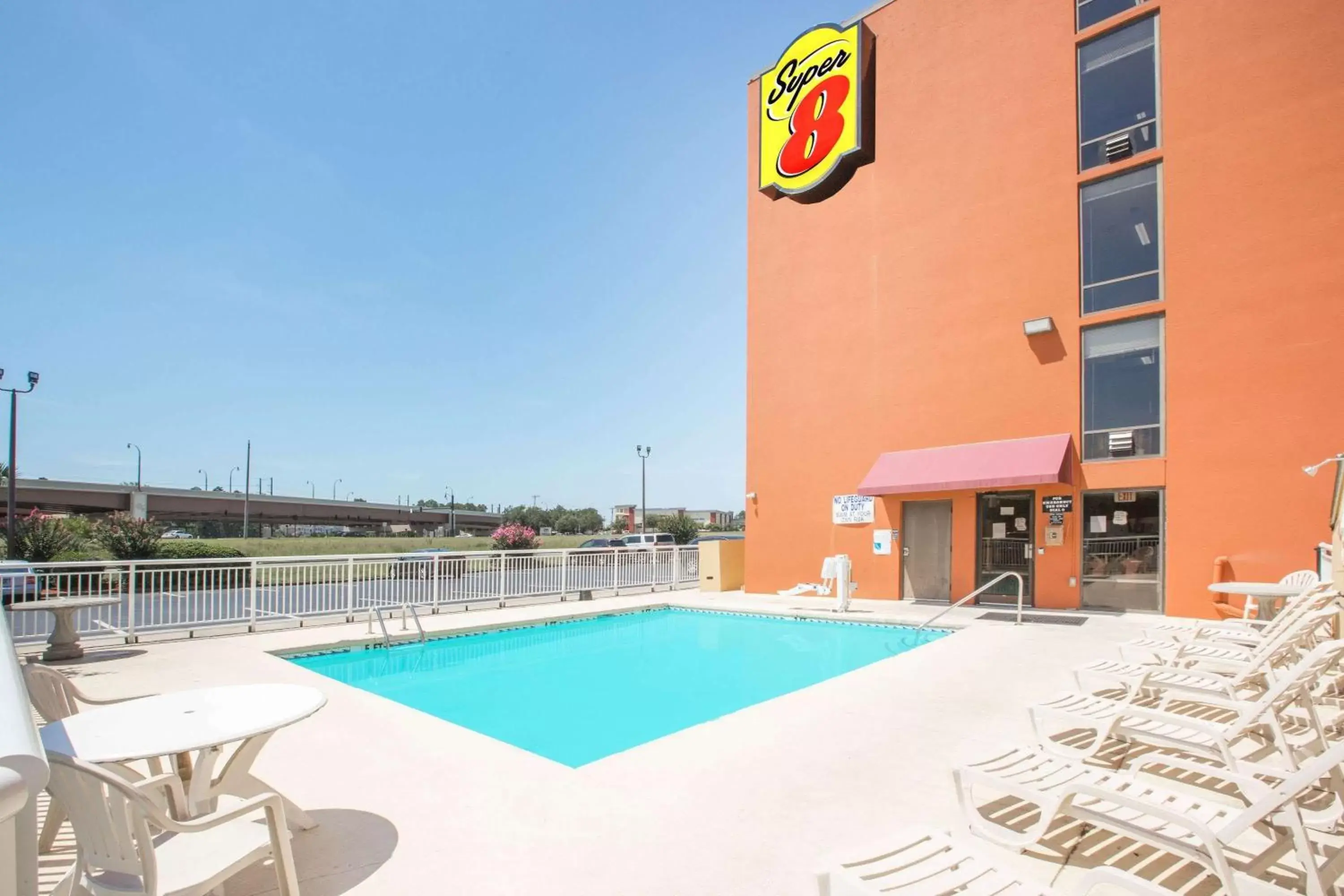 Property building, Swimming Pool in Super 8 by Wyndham Myrtle Beach/Market Common Area