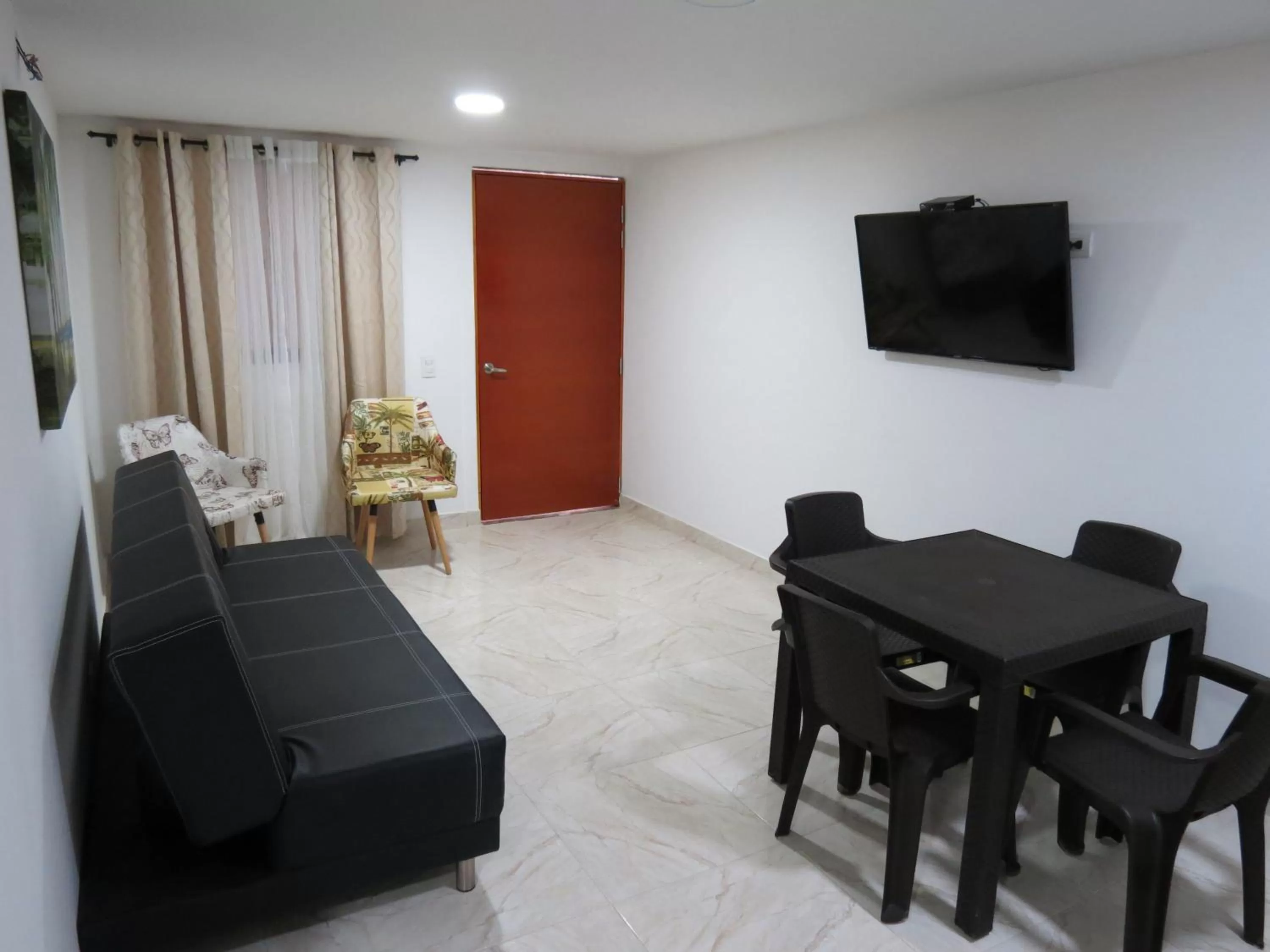 Living room, TV/Entertainment Center in ZOJO MARiNA BAY