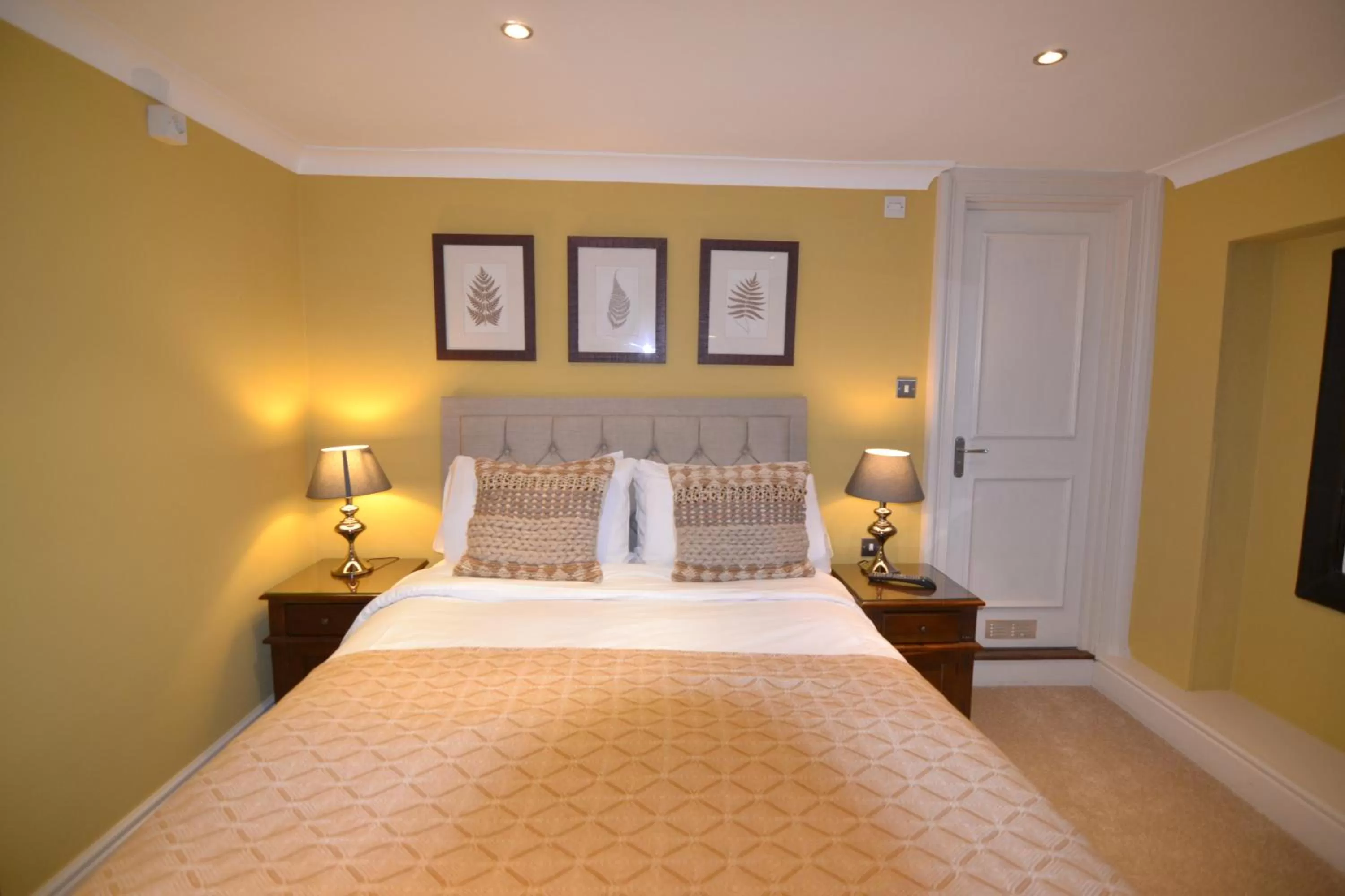 Bed in Angel and Royal Hotel