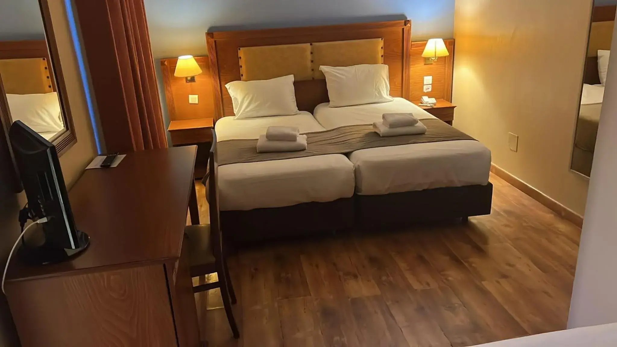 Bed in 121 Paris Hotel