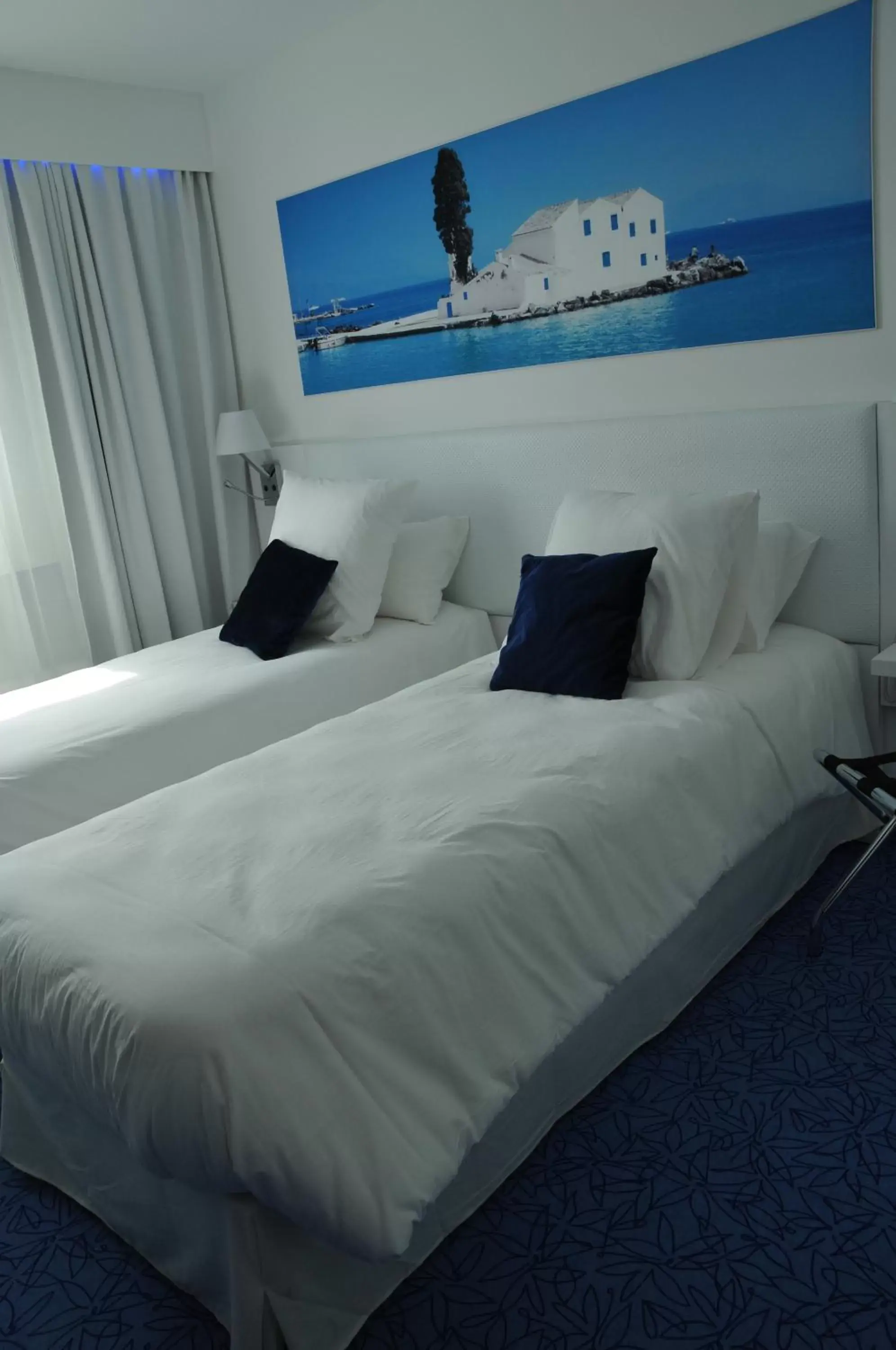 Bed in Privilège Hôtel & Apparts Eurociel Centre Comédie