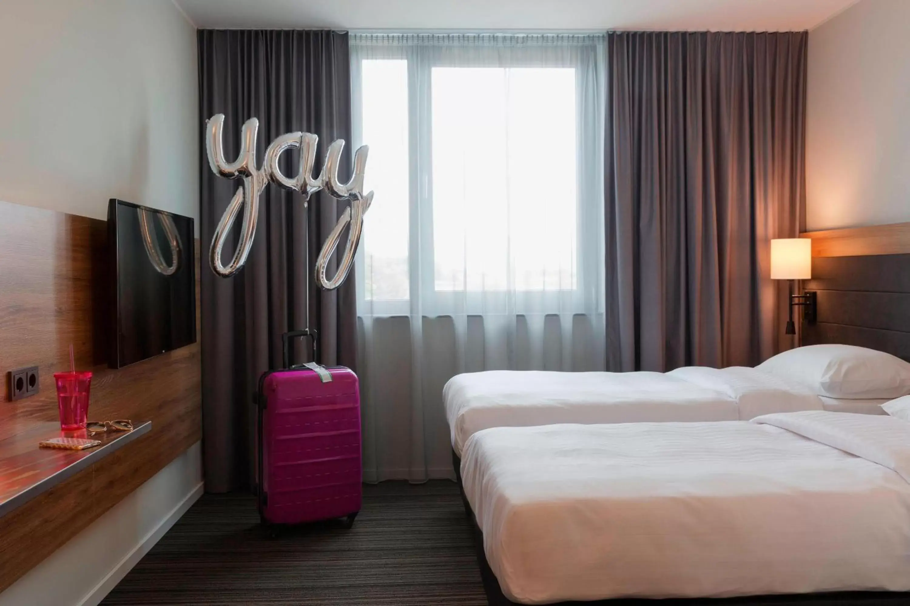 Photo of the whole room, Bed in Moxy by Marriott Stuttgart Airport/Messe