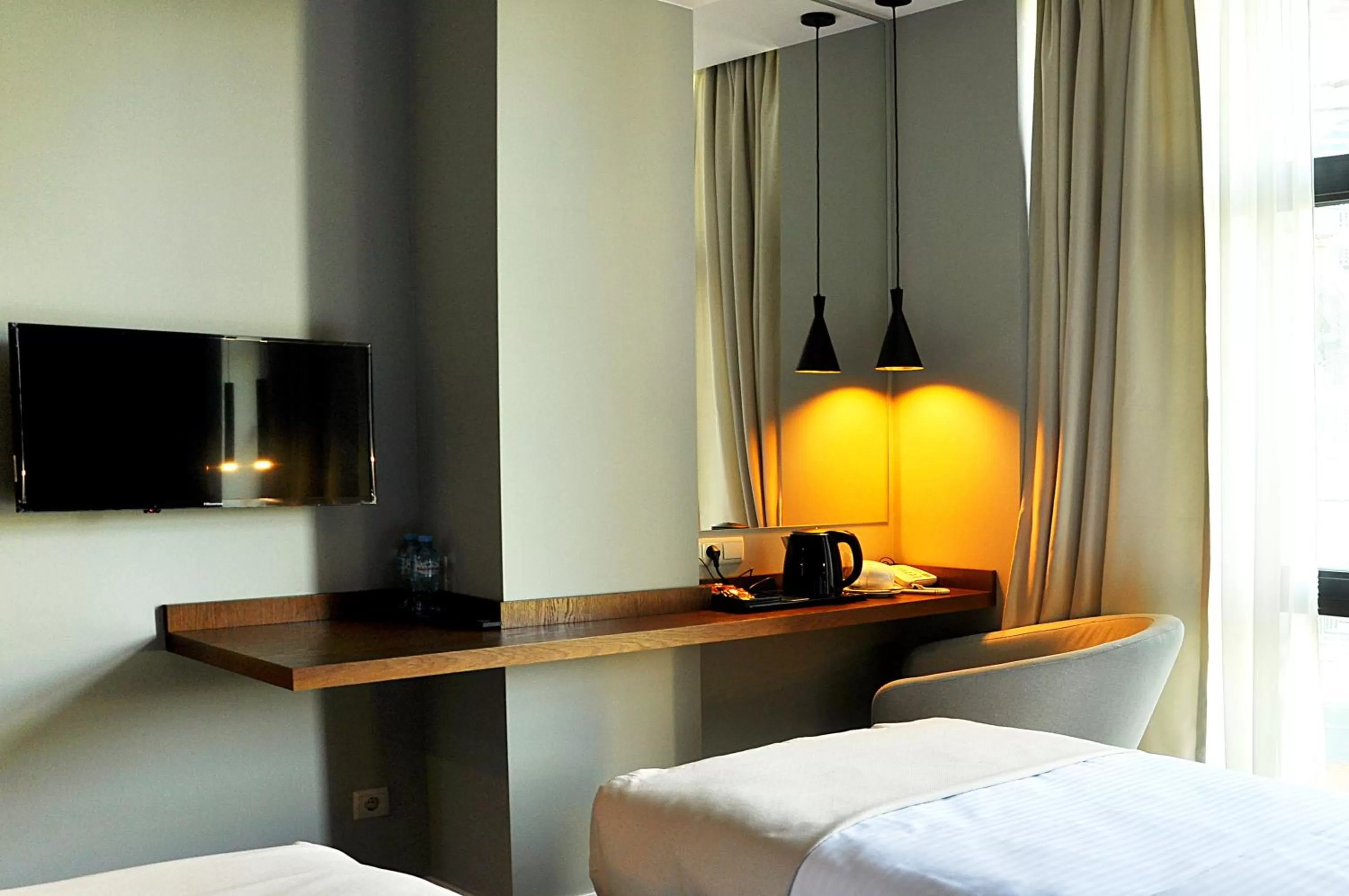 Seating area, Bed in River View Hotel Tbilisi