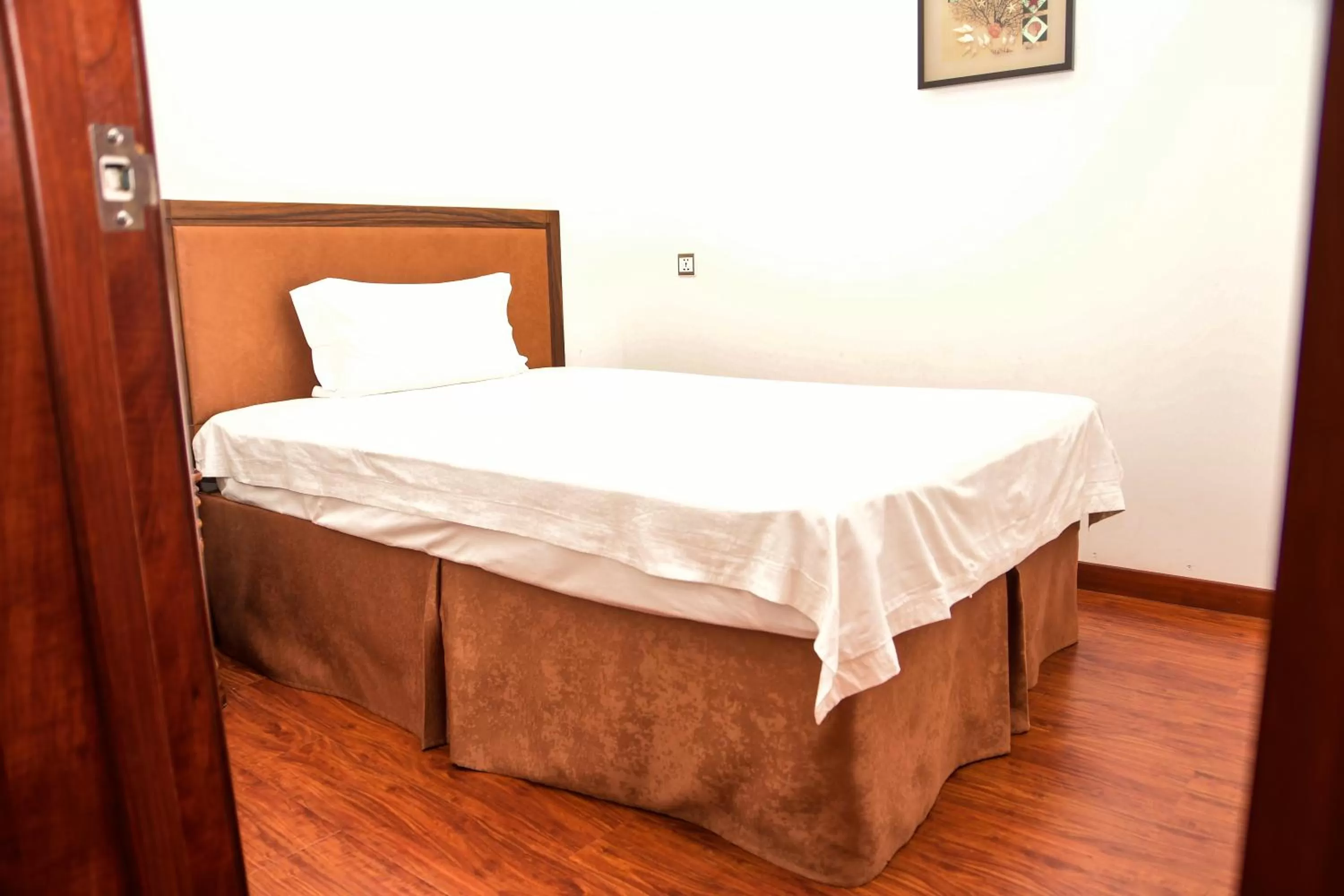 Bed in Victoria Beach Hotel