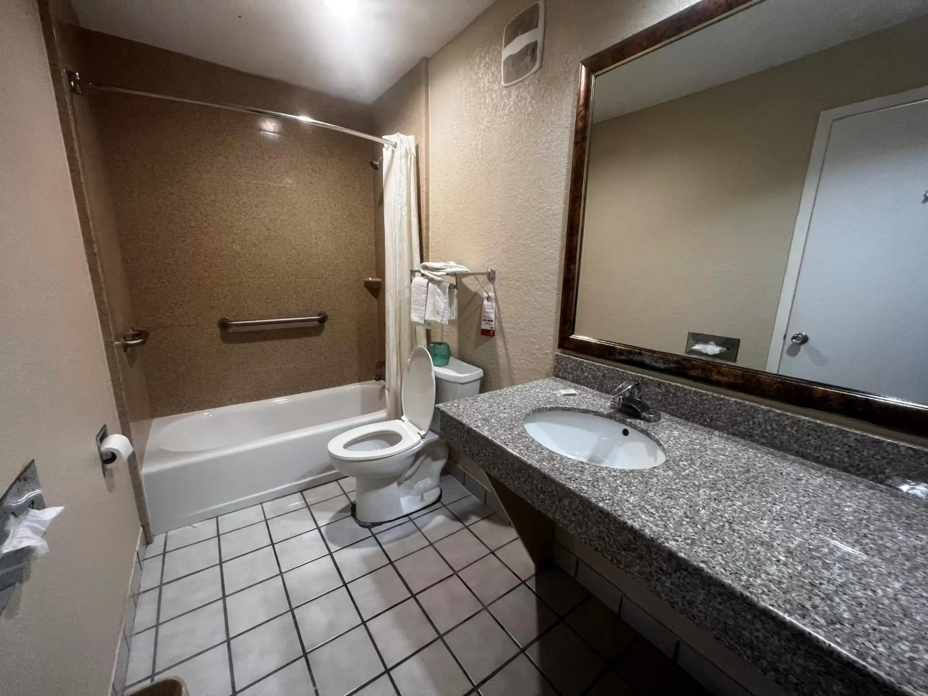 Bathroom in Super 8 by Wyndham La Marque TX/Texas City Area