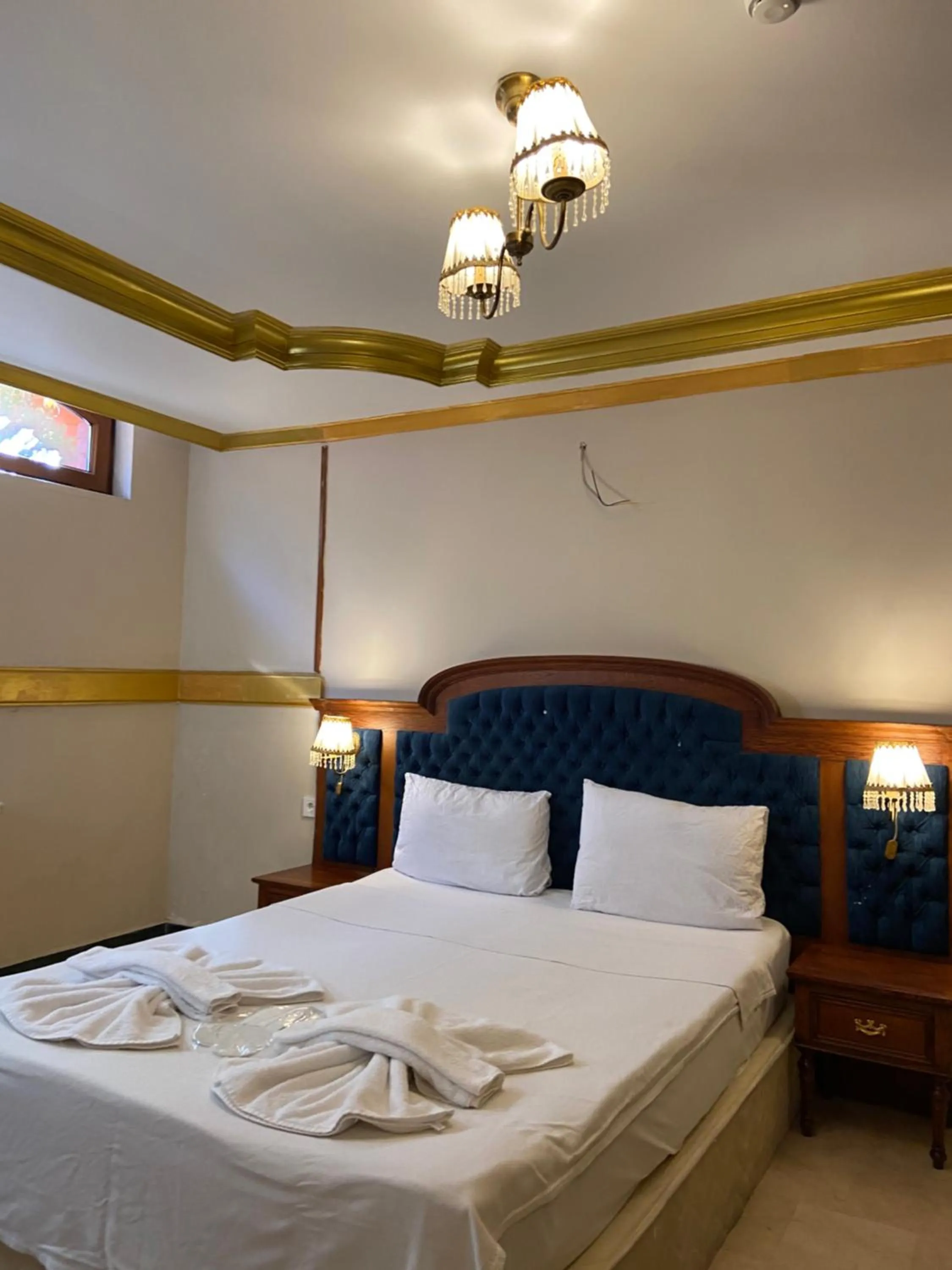 Bed in Aruna Boutique Hotel