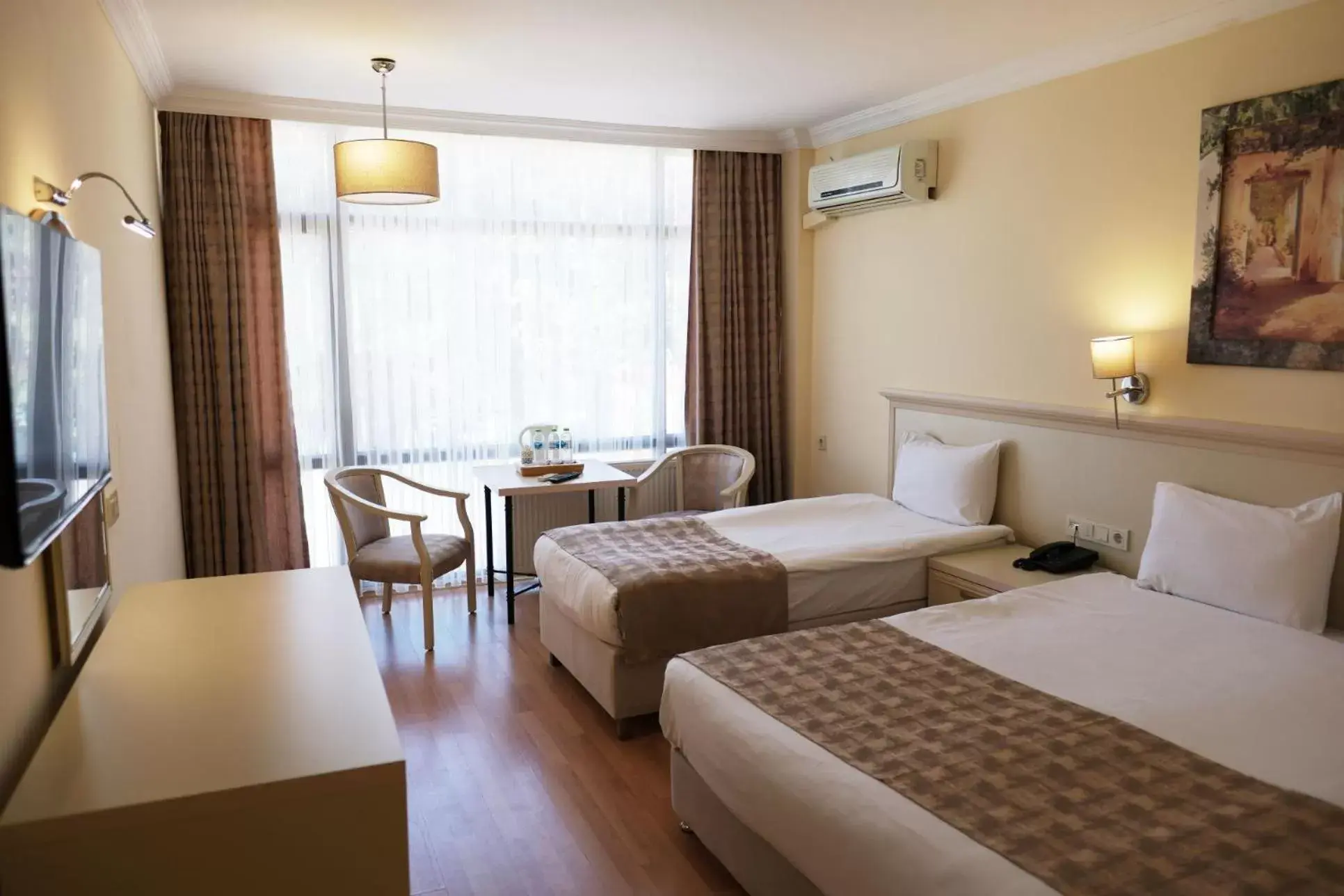 Superior Triple Room in Troia Tusan Hotel Superior Triple Room in Troia Tusan Hotel