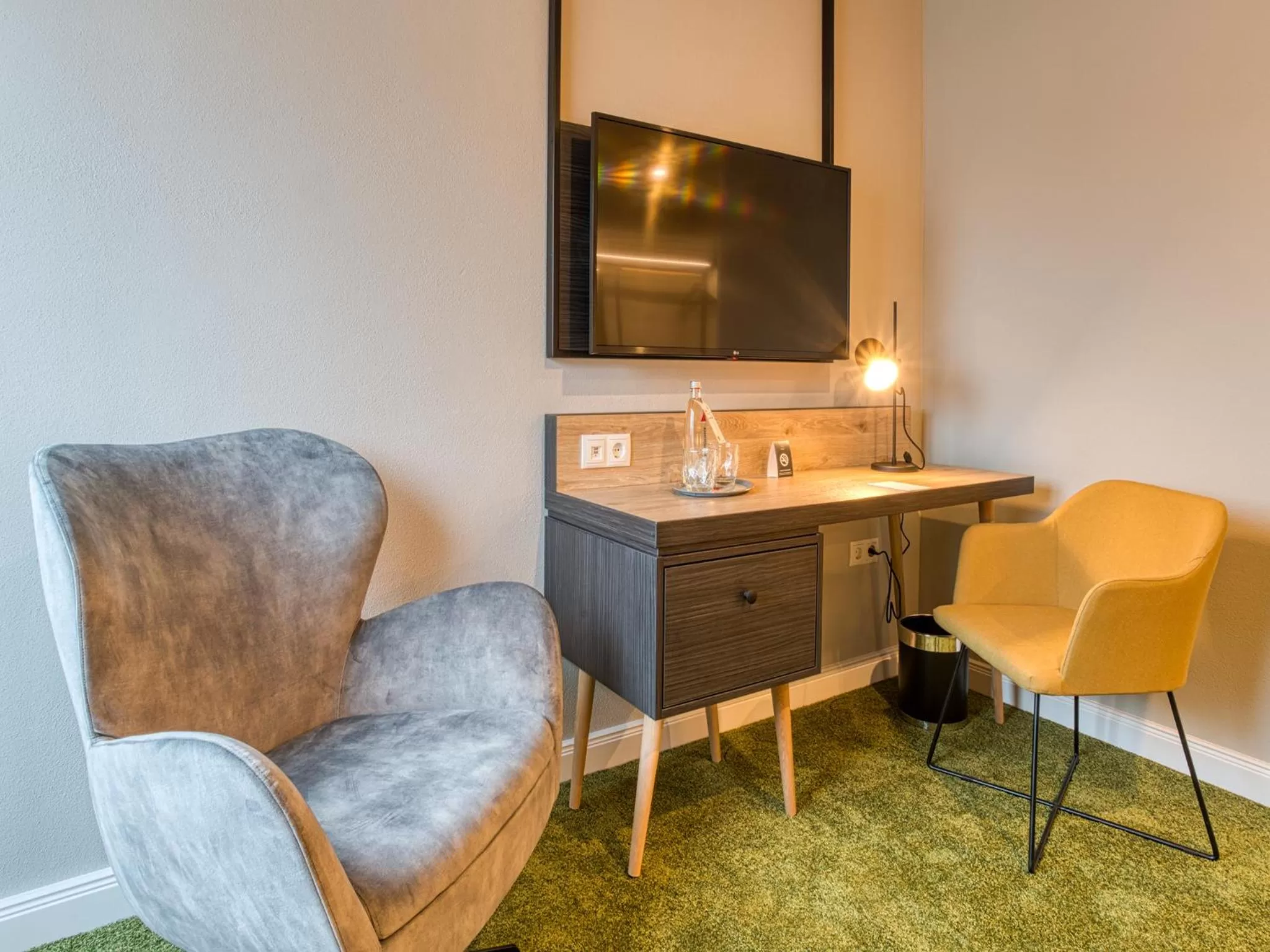 Photo of the whole room, TV/Entertainment Center in NYCE Hotel Ingolstadt