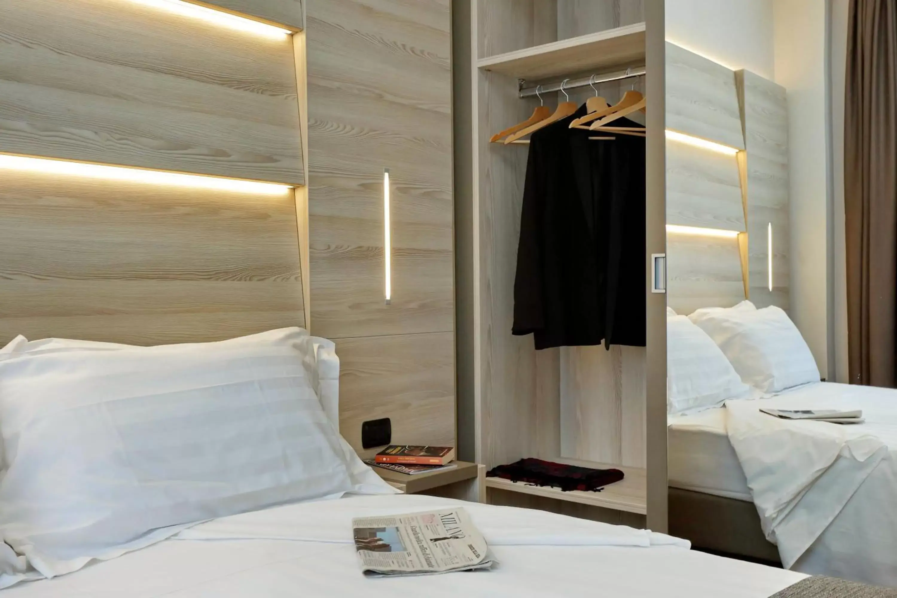 Bed in Duomo Hotel & Apartments