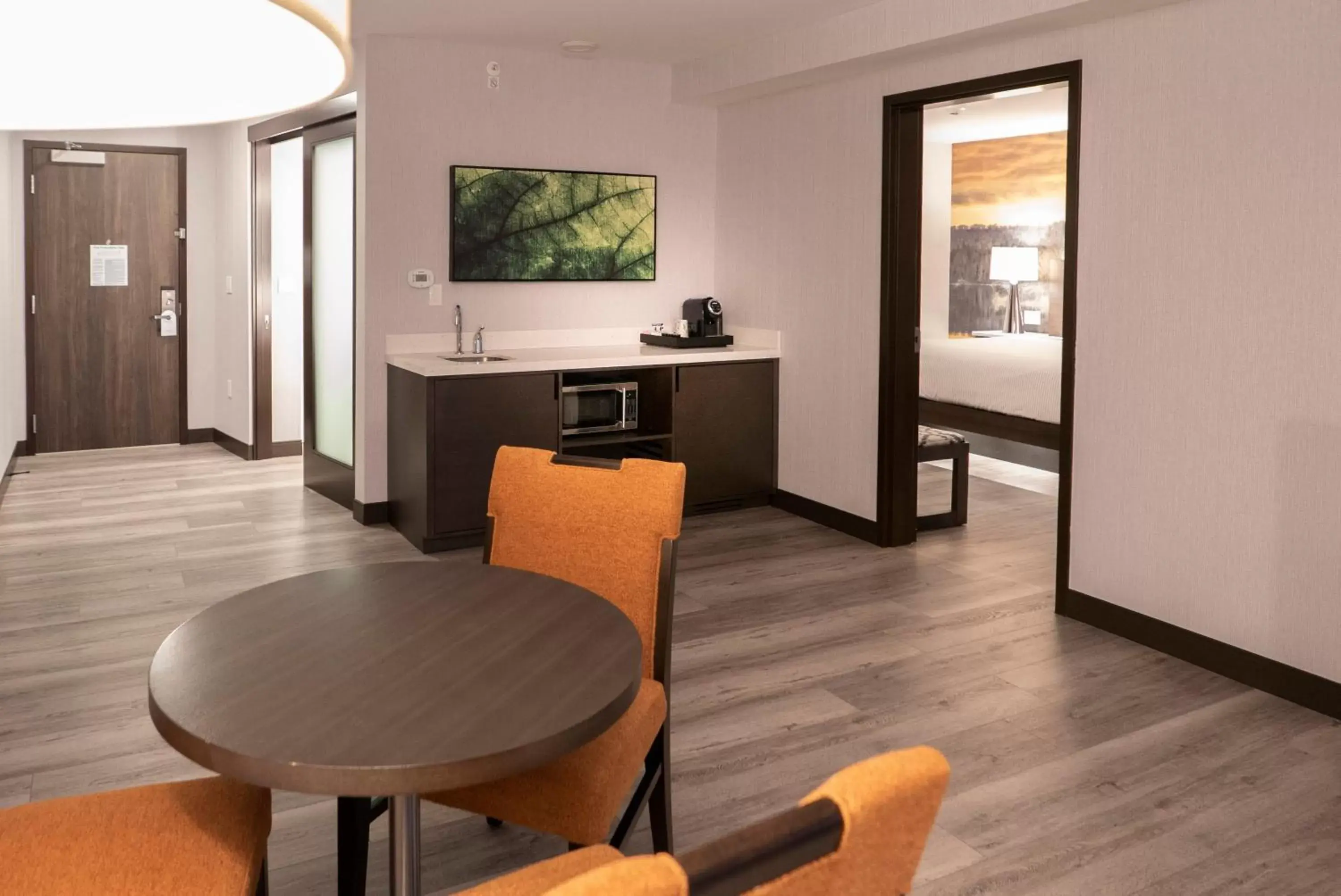 Living room, Dining Area in Cambria Hotel Detroit-Shelby Township