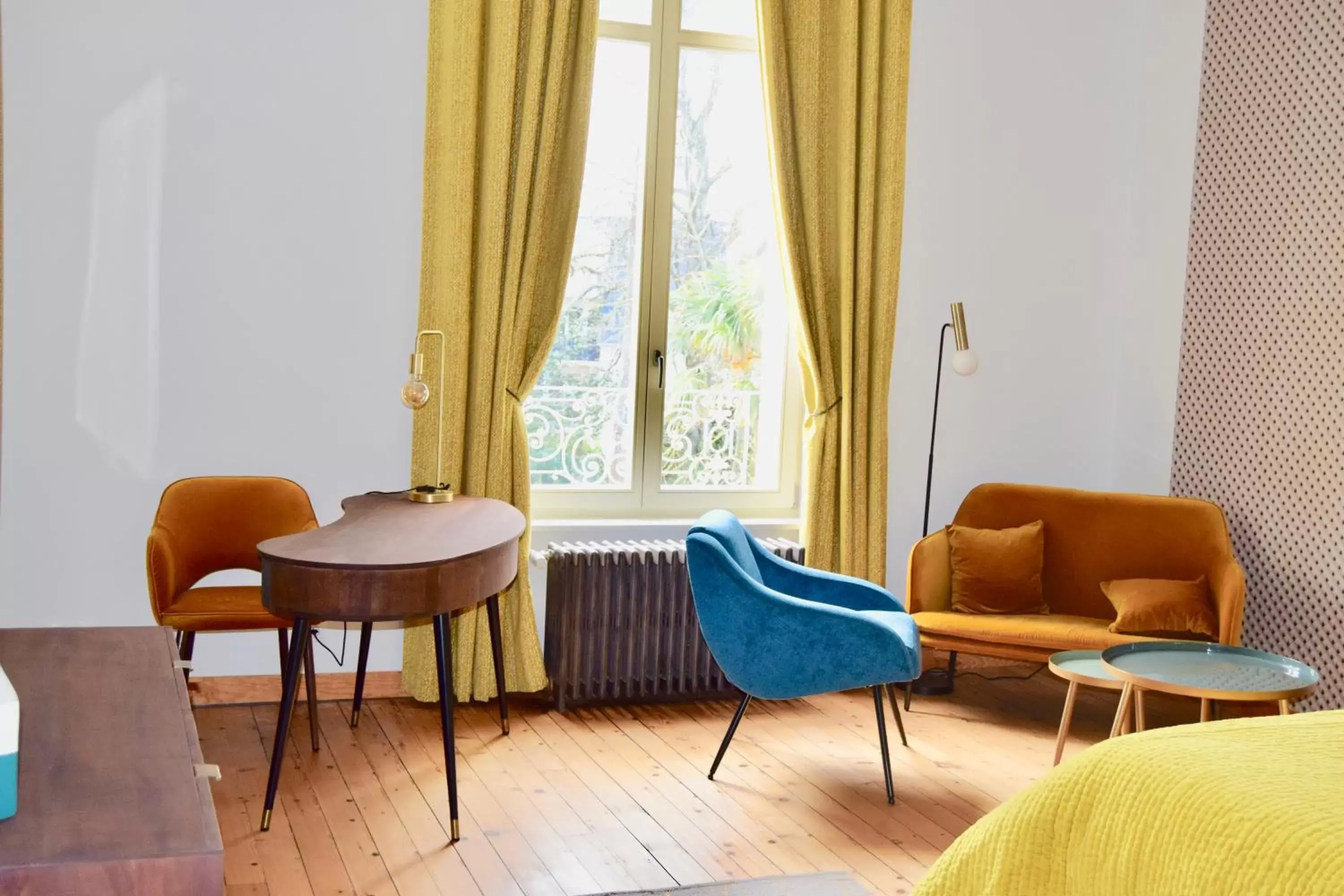 Seating area in Chambres d'Hôtes Le Clos des Marronniers