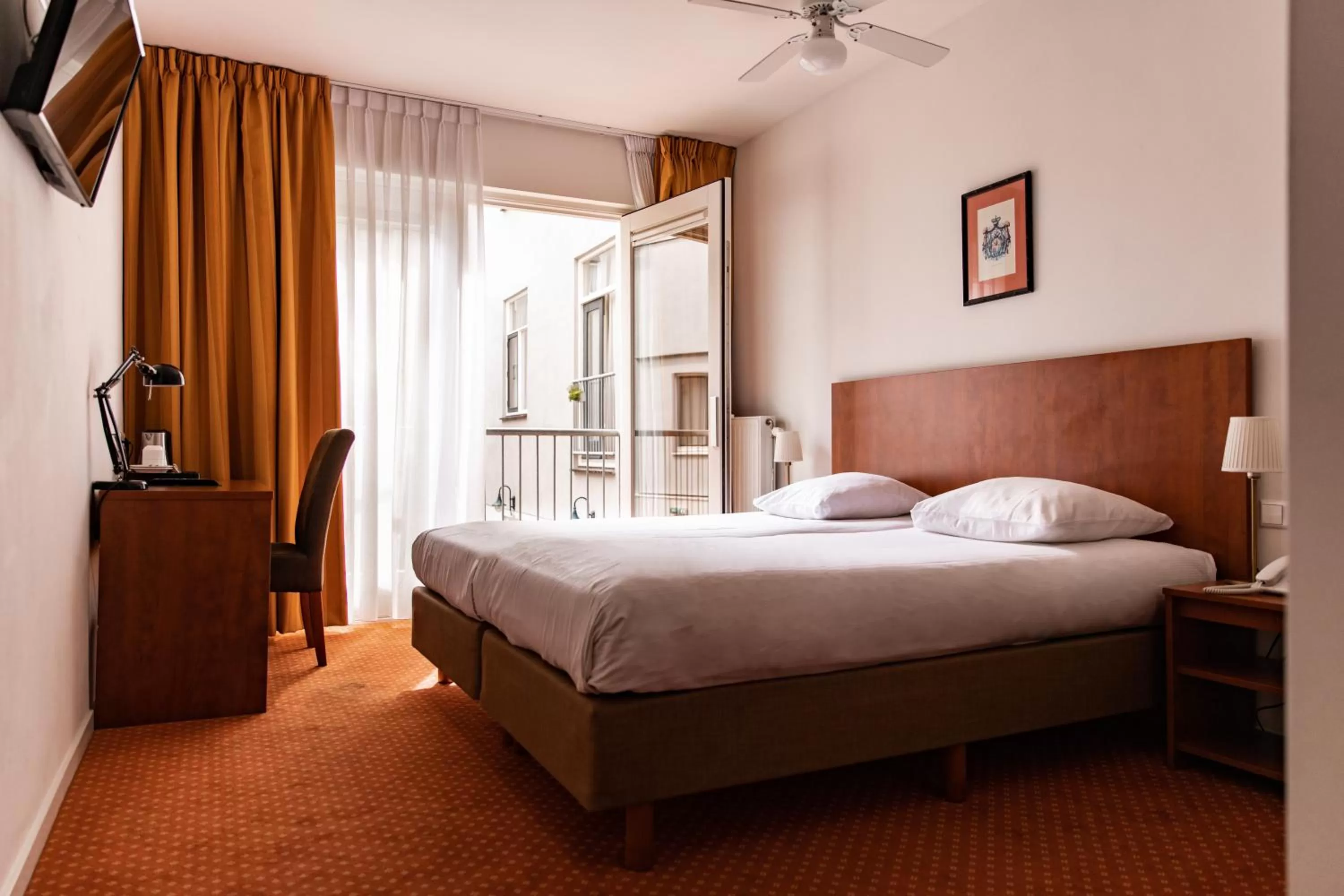 Bed in Ambassador City Centre Hotel