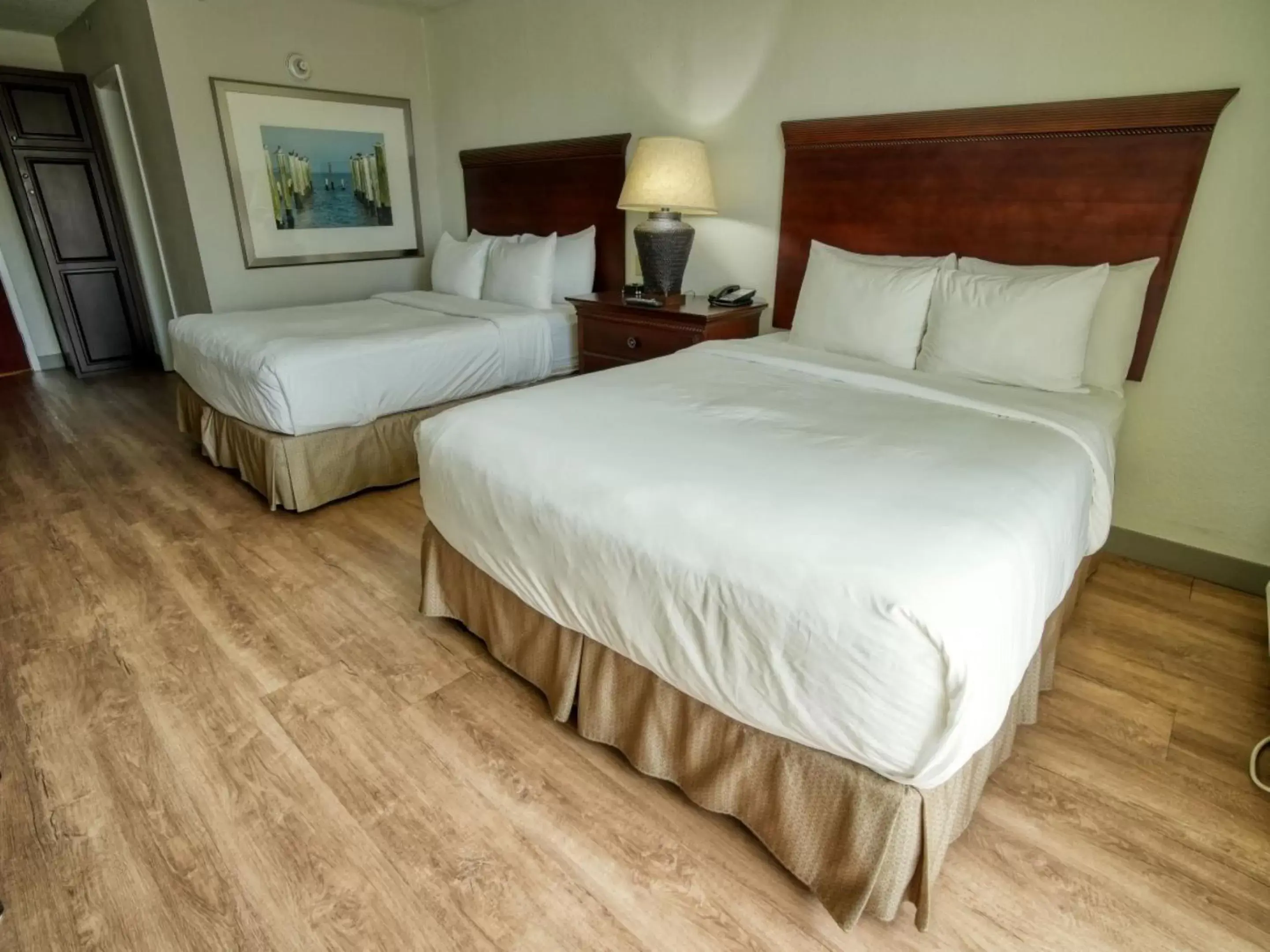 Bed in Treasure Bay Resort and Marina
