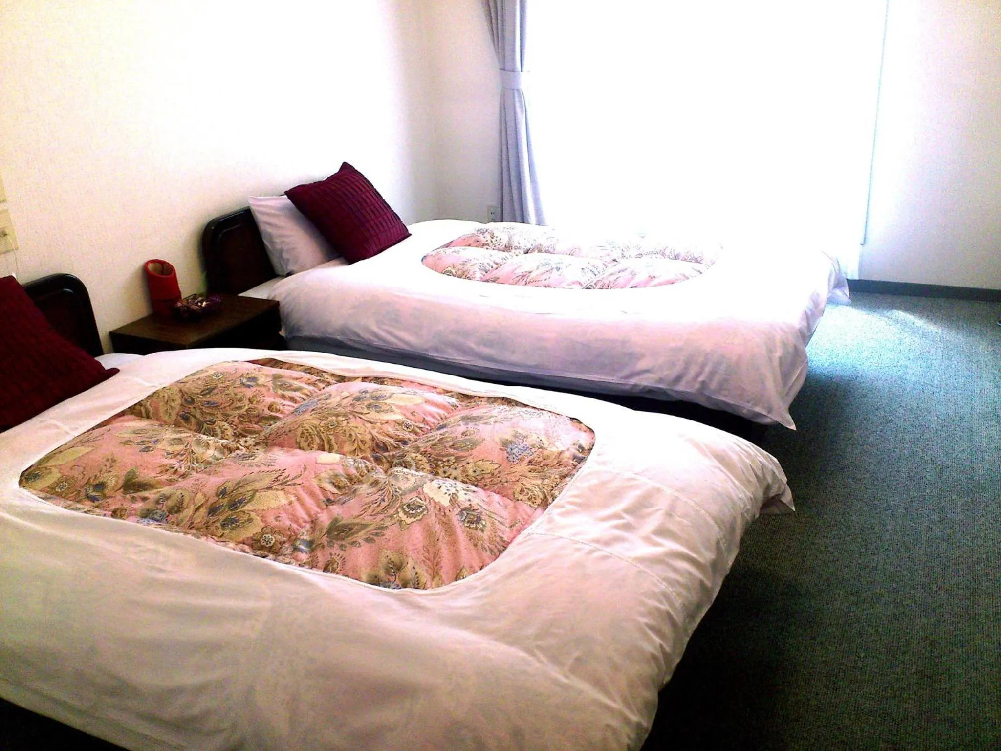 Bed in Tenjin Lodge
