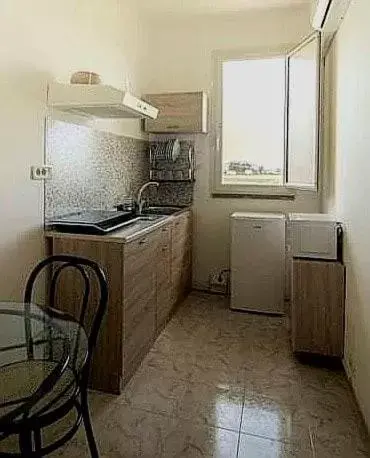 Kitchen/Kitchenette in Albergo Luisss