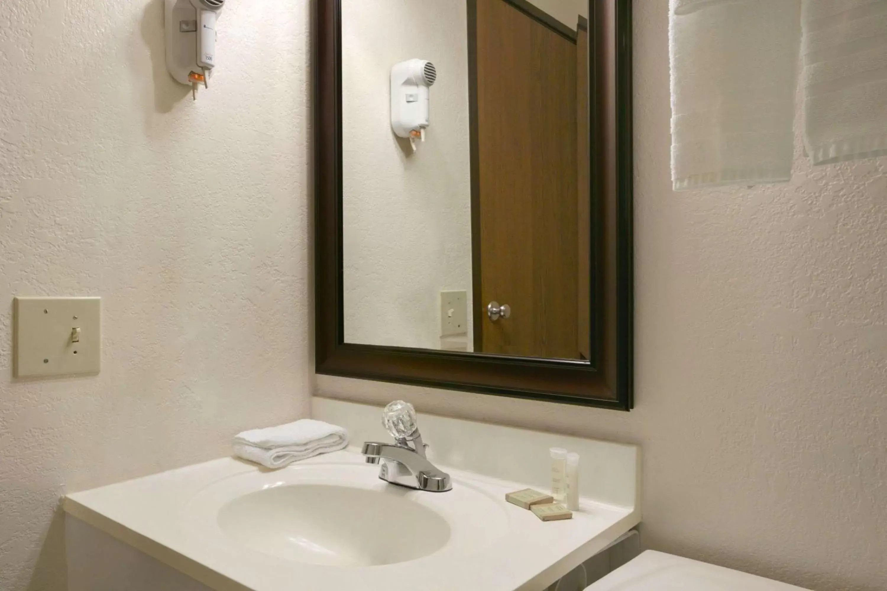 Bathroom in Super 8 by Wyndham Saginaw