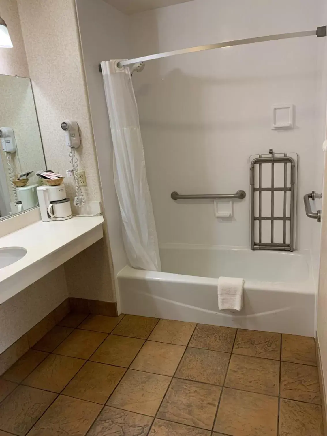 Bathroom in Olive Tree Inn & Suites
