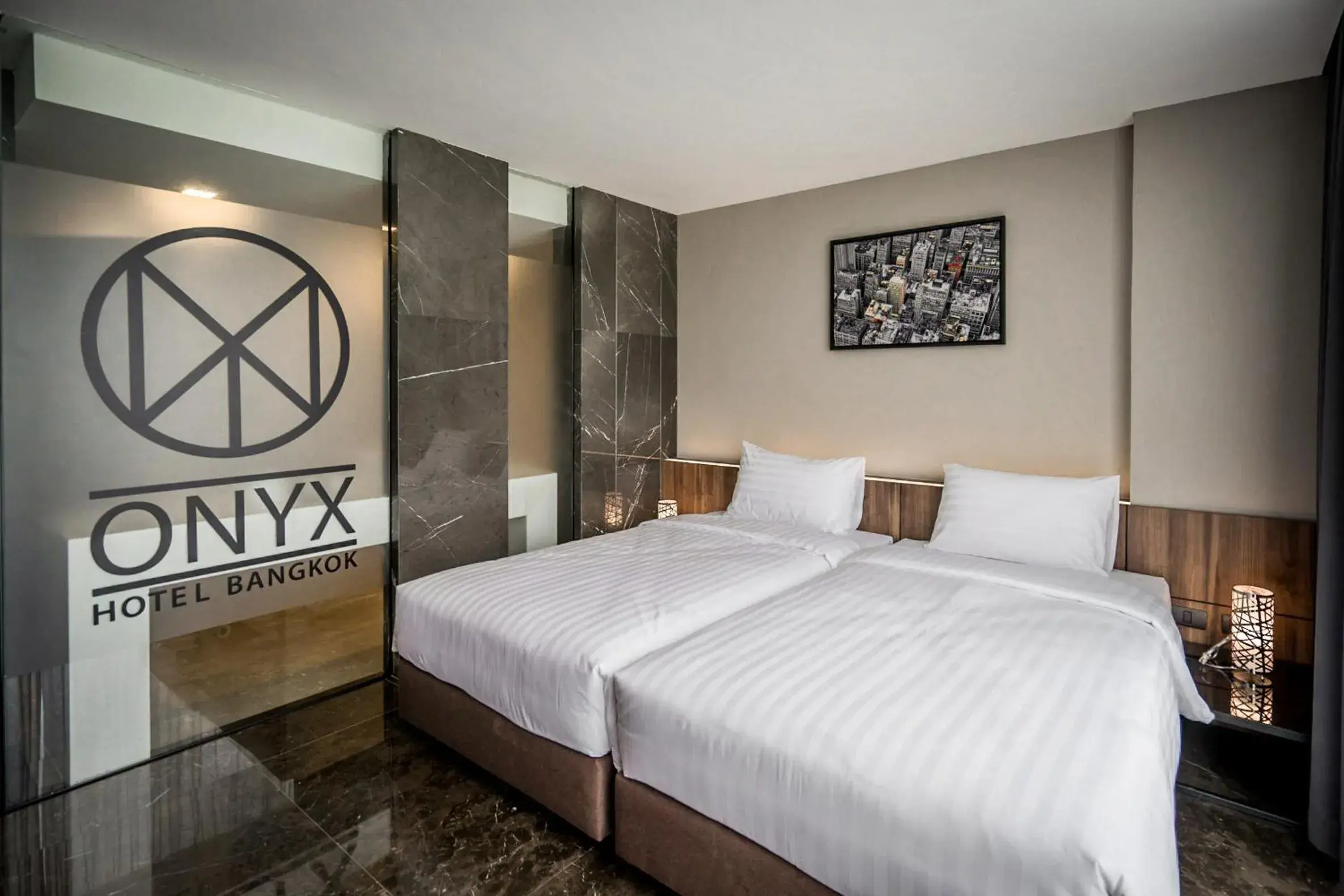 Bed in Onix Hotel Bangkok