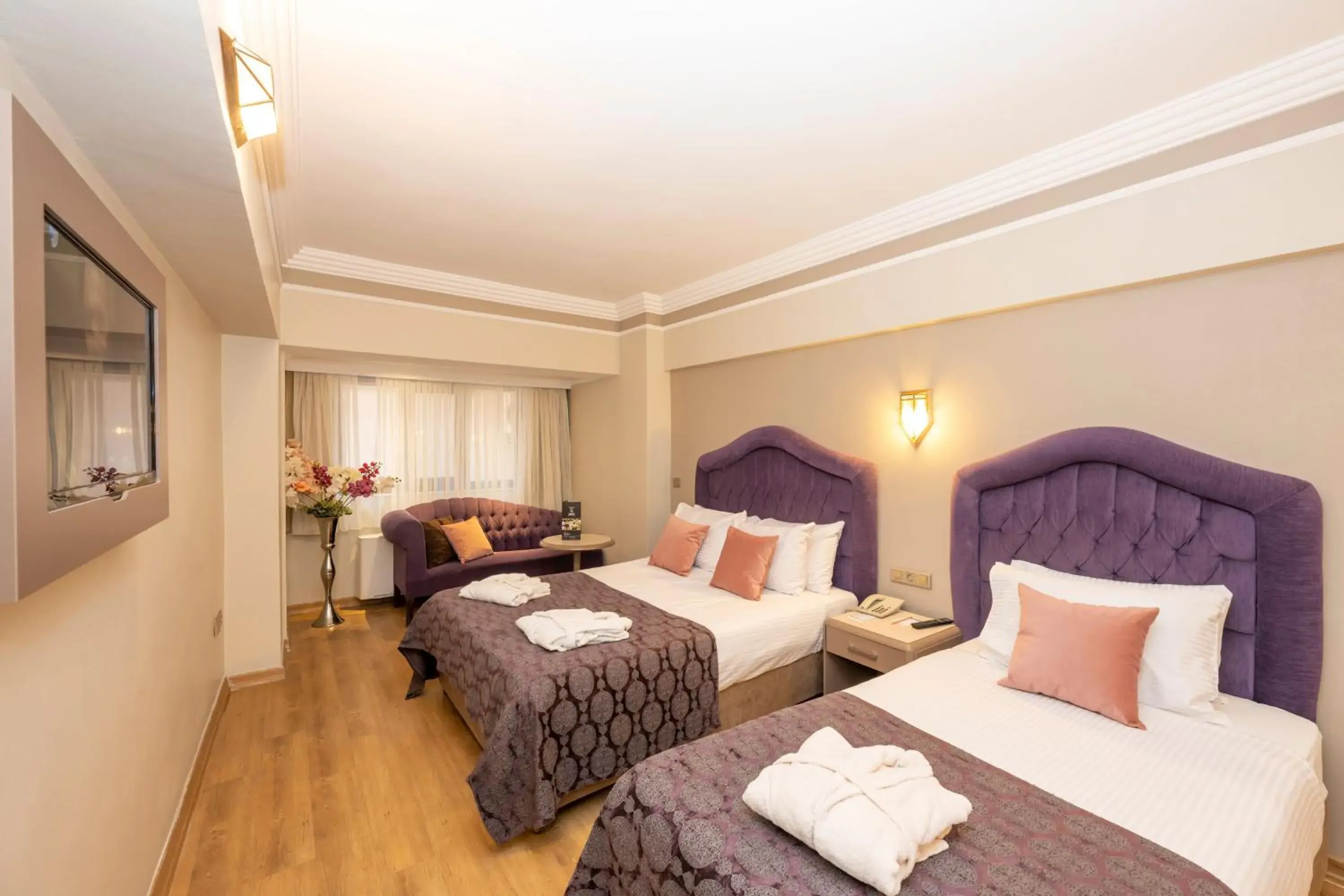 Bed in Grand Anka Hotel