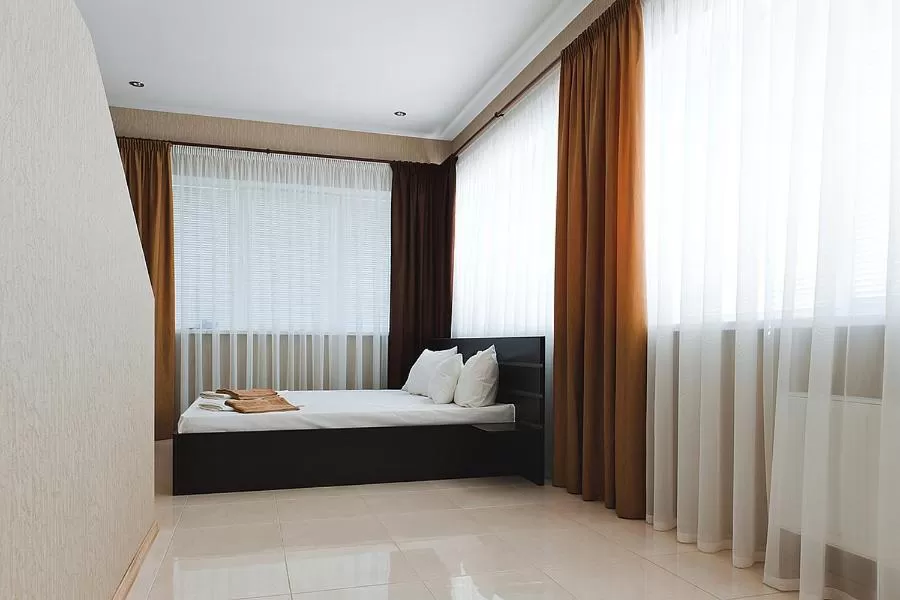 Photo of the whole room, Bed in Hotel 8th Mile