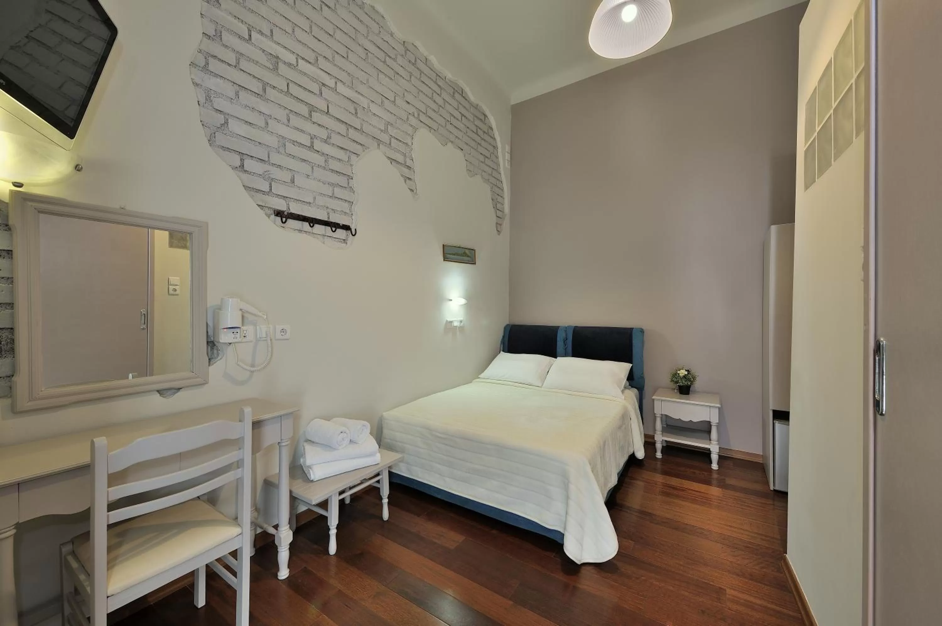 Bed in Dryades & Orion Hotel