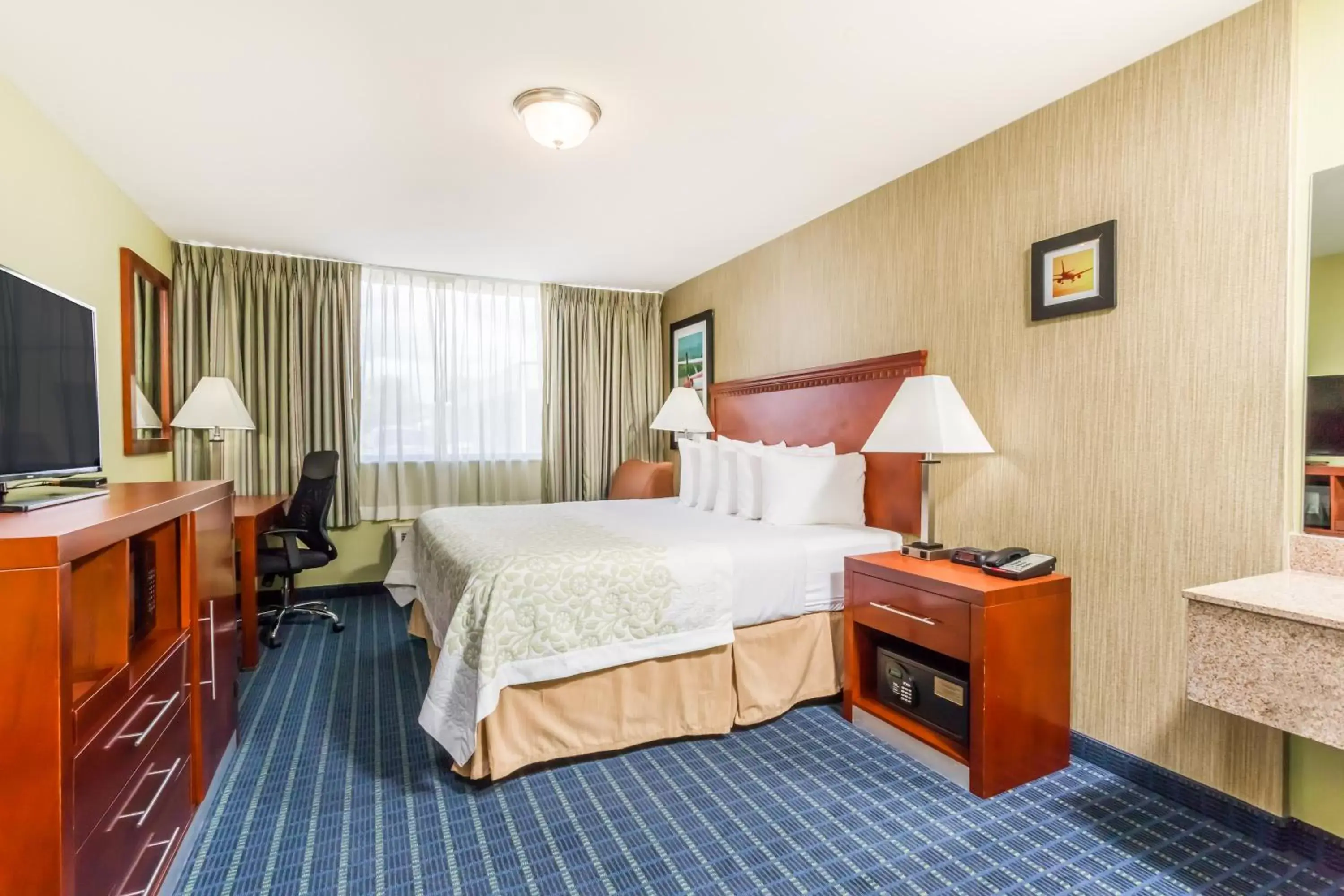 Bedroom, Bed in Days Inn by Wyndham Windsor Locks / Bradley Intl Airport