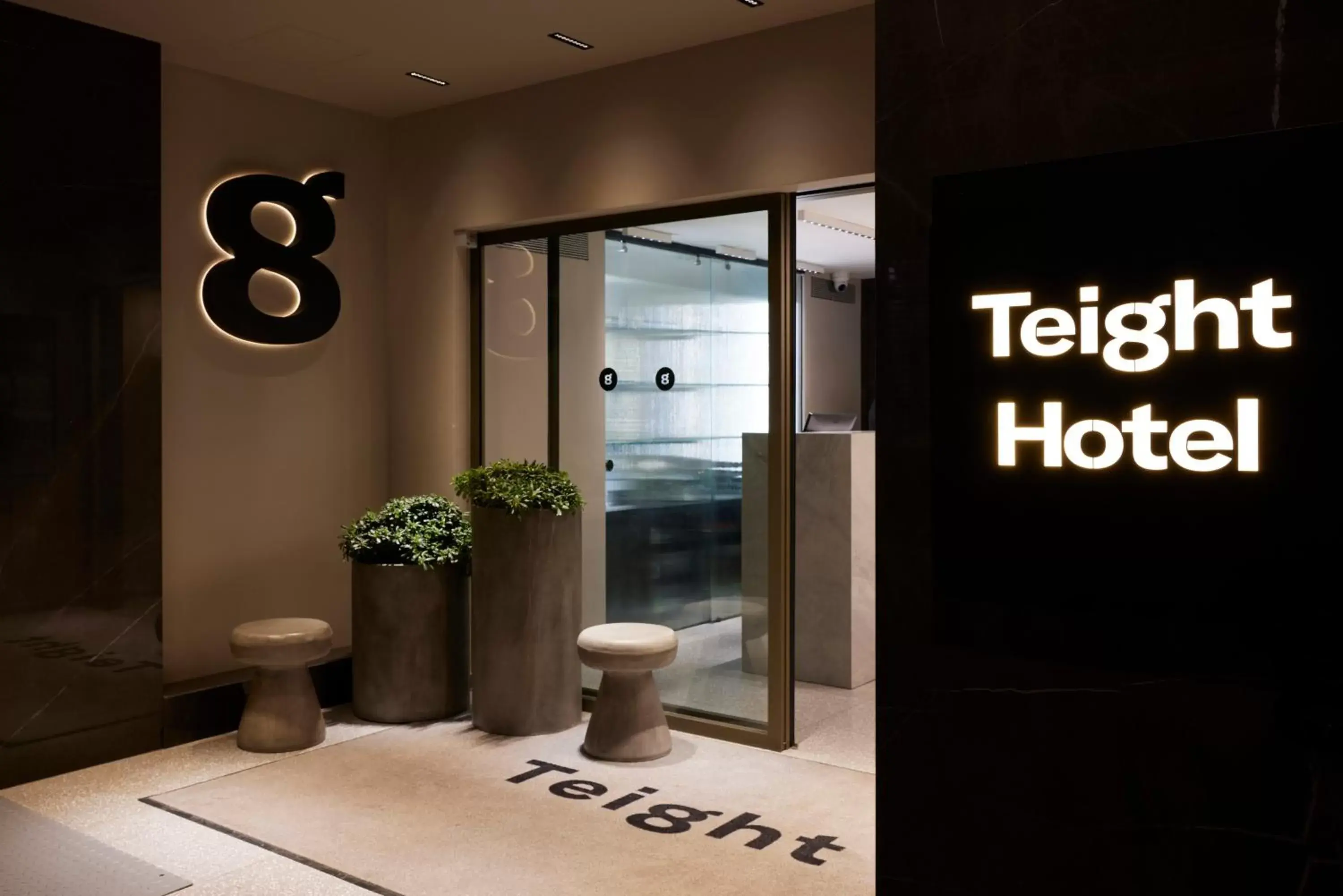 Property logo or sign in Teight Hotel