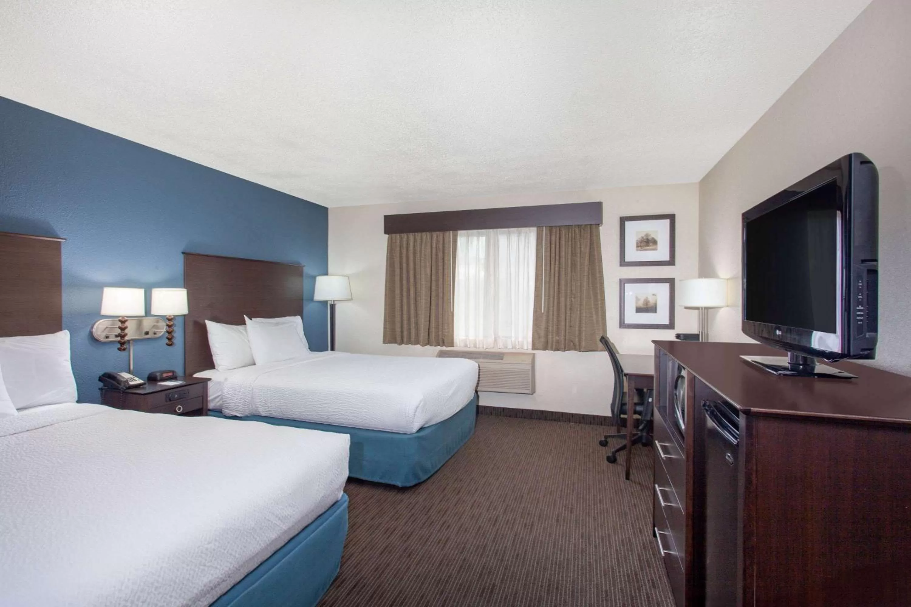 Photo of the whole room, Bed in AmericInn by Wyndham Mankato Event Center near MSU