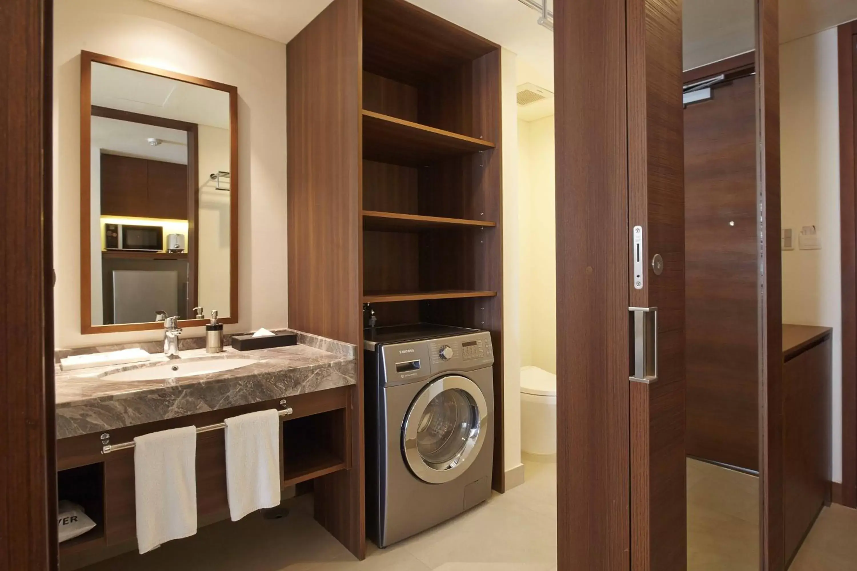 Photo of the whole room, Bathroom in Axia South Cikarang Service Apartment