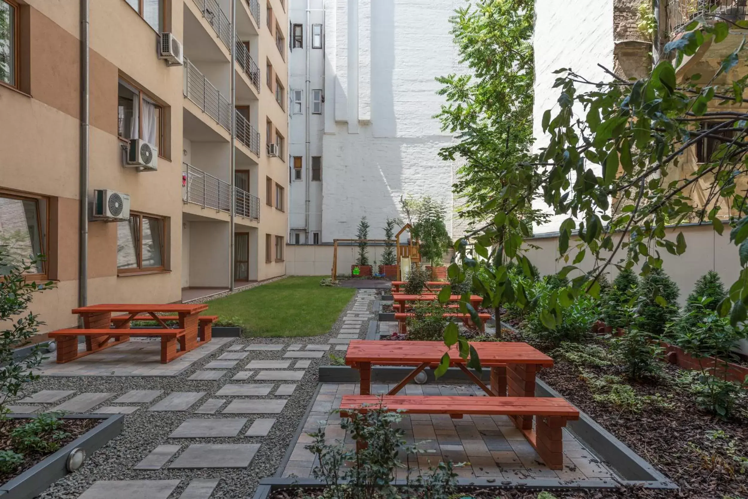 Children play ground in Corvin Plaza Apartments & Suites