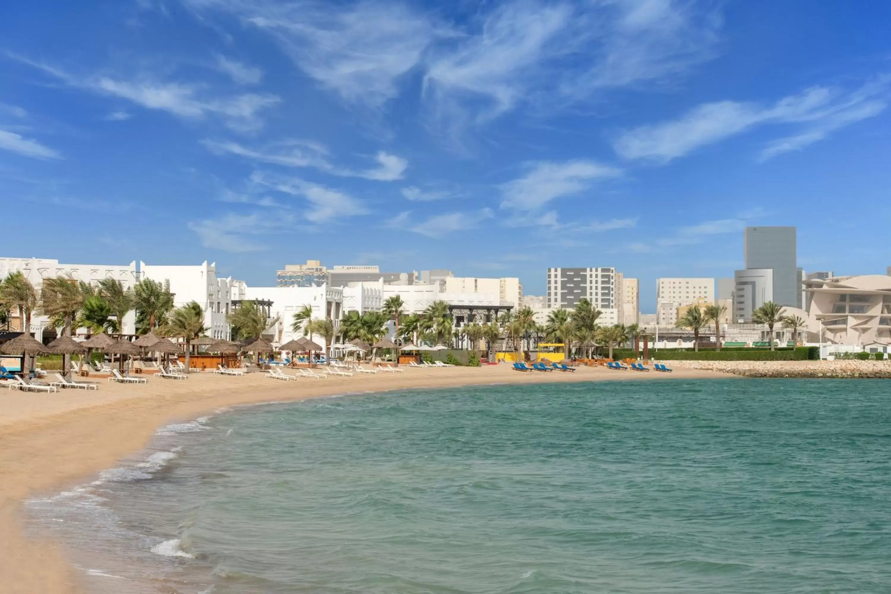 Beach in Sharq Village & Spa, a Ritz-Carlton Hotel