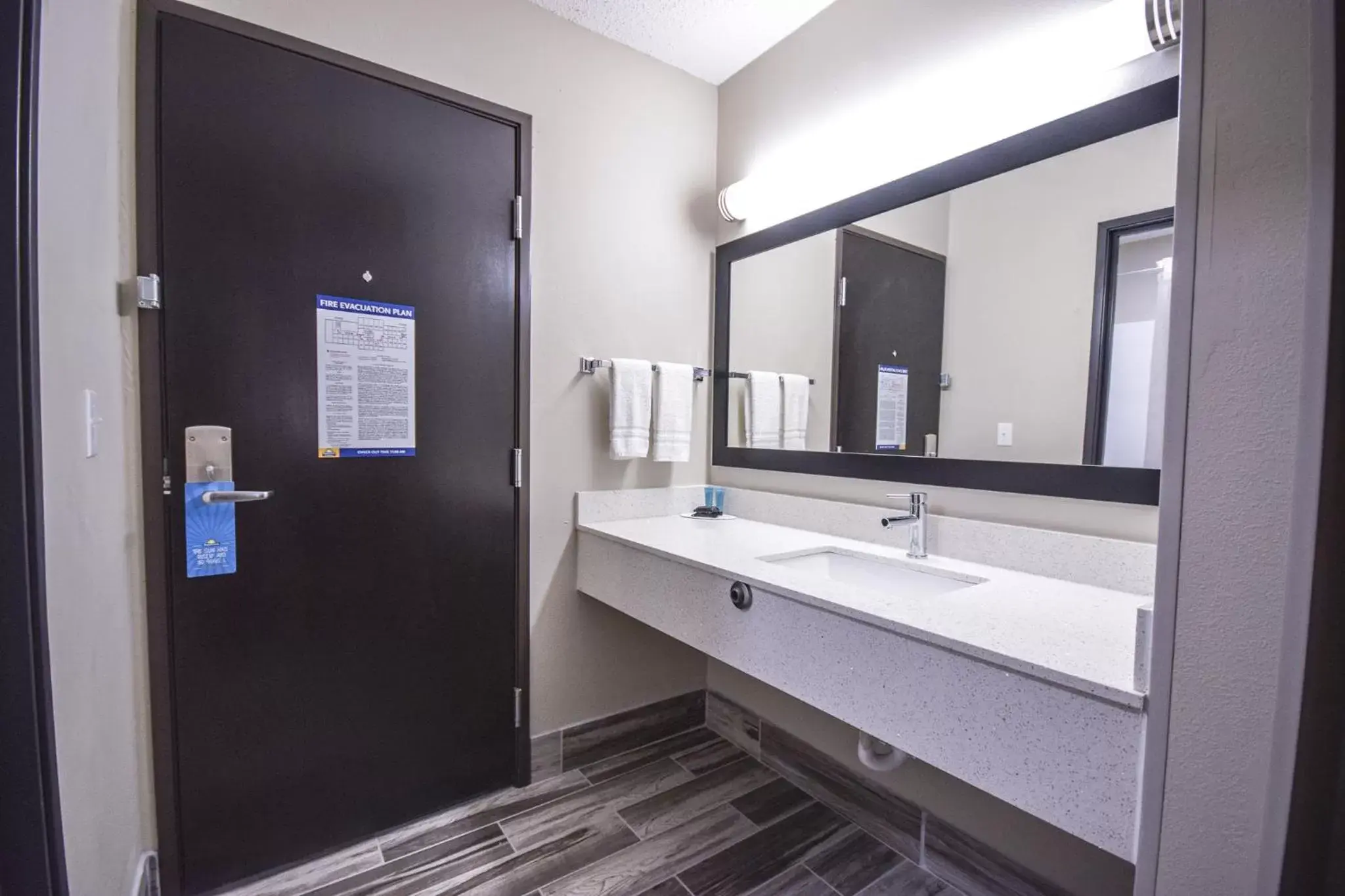 Bathroom in Days Inn & Suites by Wyndham Wisconsin Dells